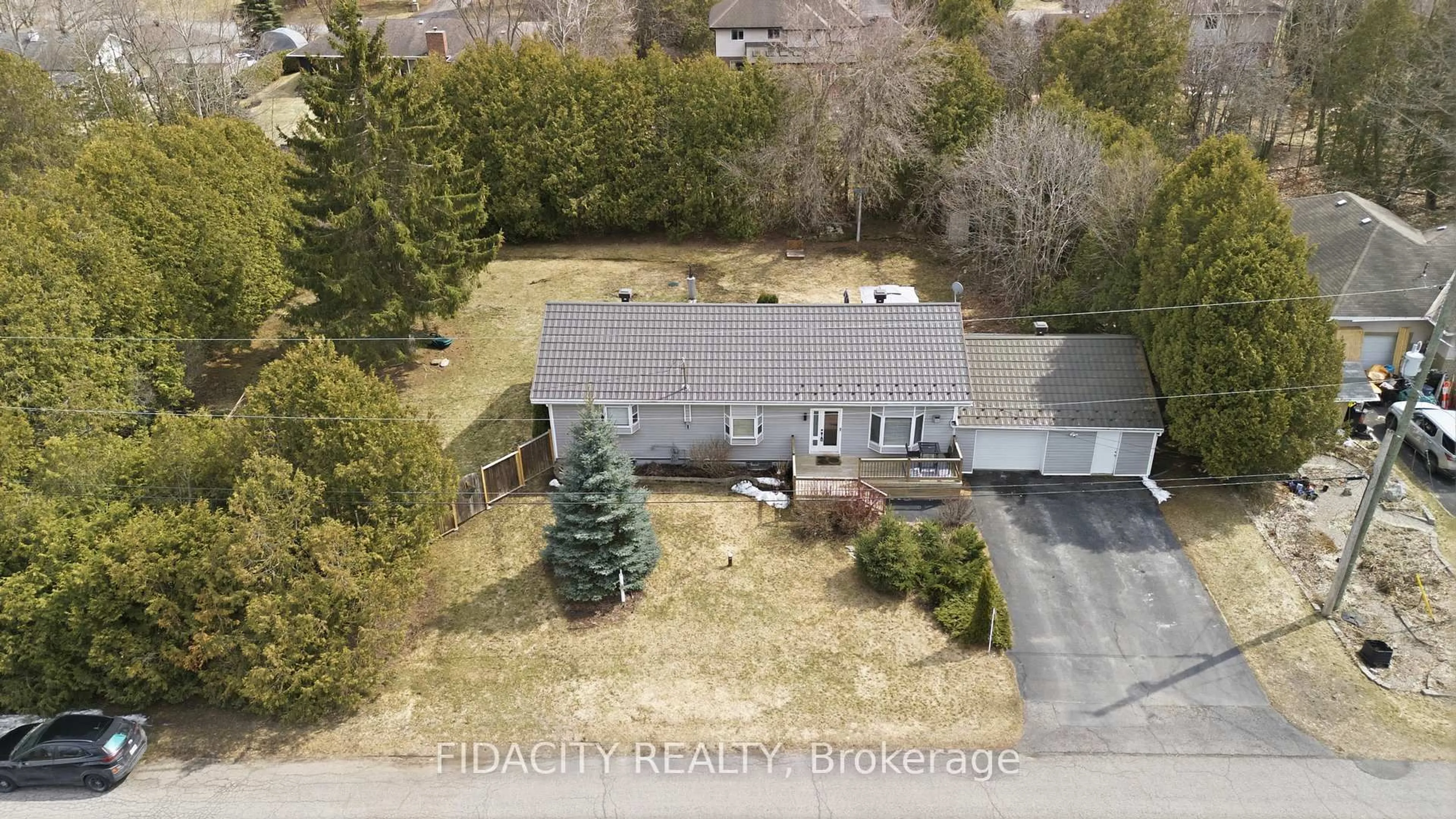A pic from outside/outdoor area/front of a property/back of a property/a pic from drone, street for 6560 Jack Pine Cres, Greely Ontario K4P 1E1