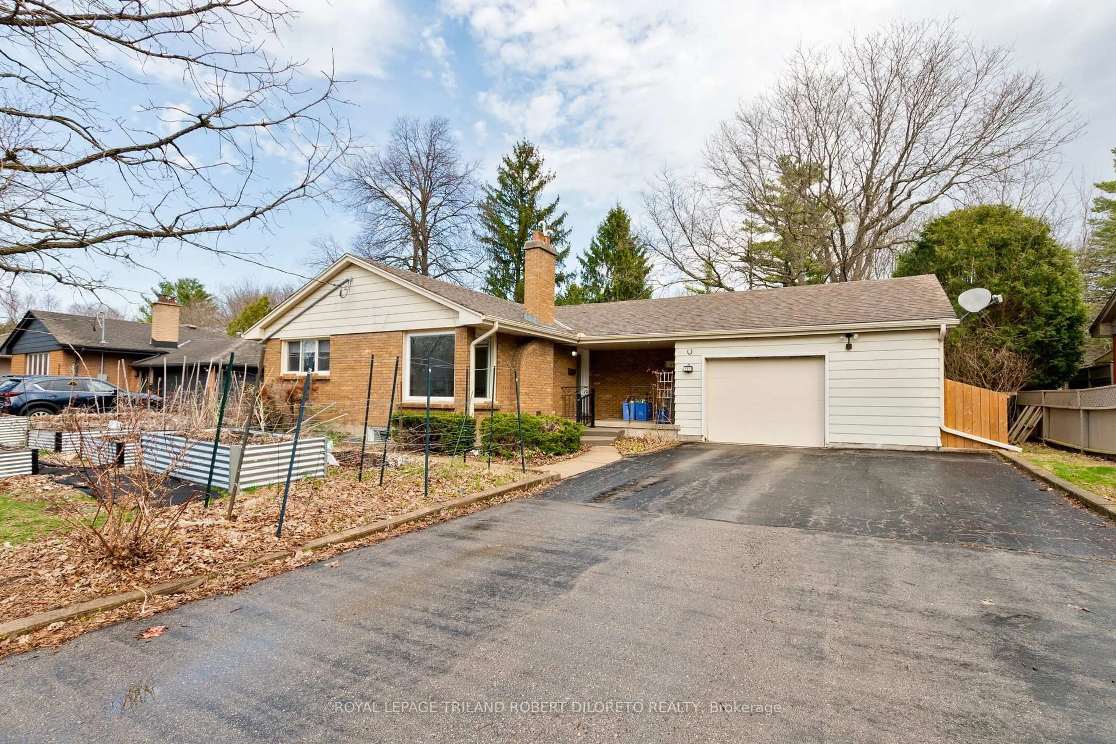 Home with brick exterior material, street for 389 Fox Ave, London North Ontario N6G 1H7