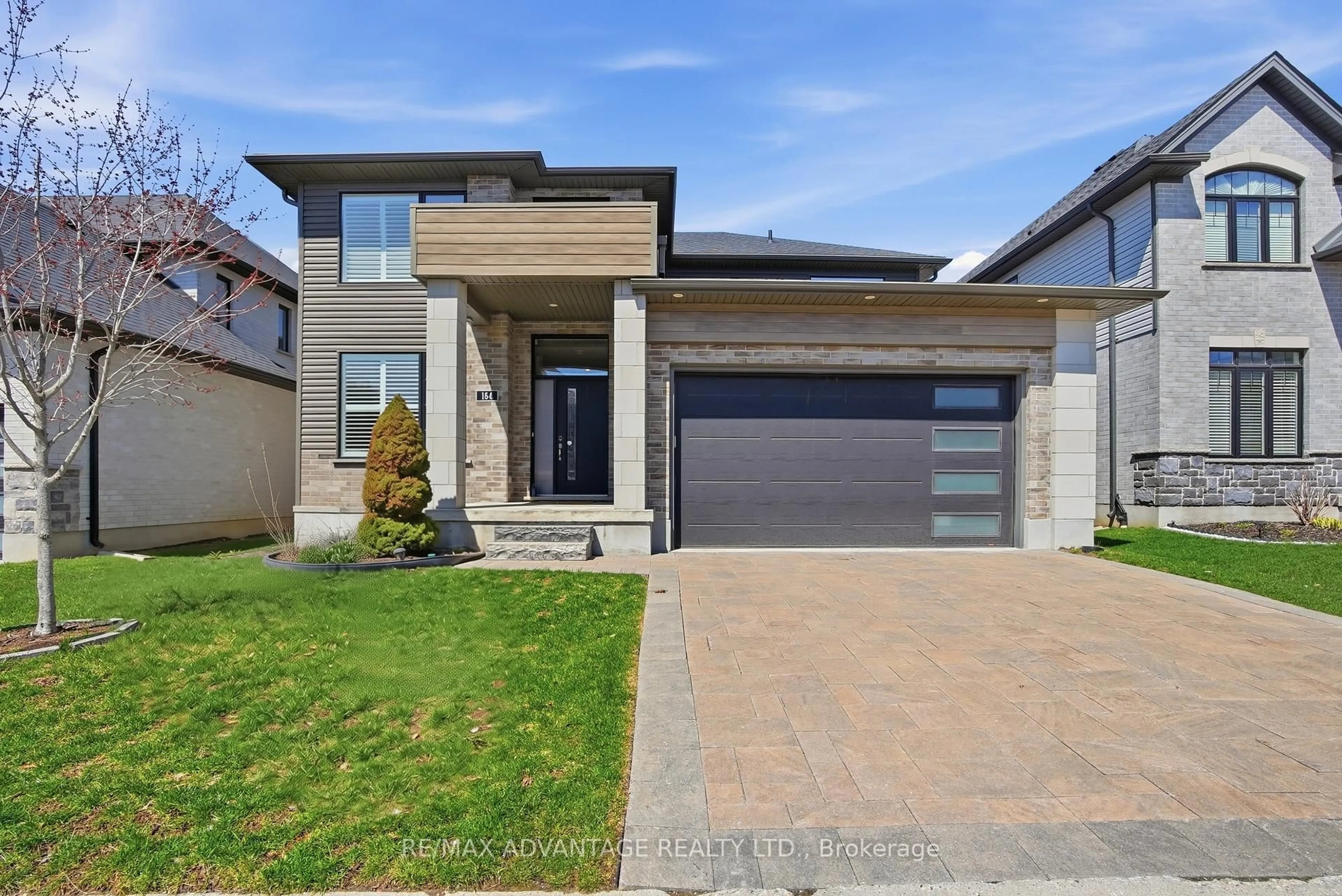 Home with brick exterior material, street for 1061 Eagletrace Dr #164, London North Ontario N6G 0T3