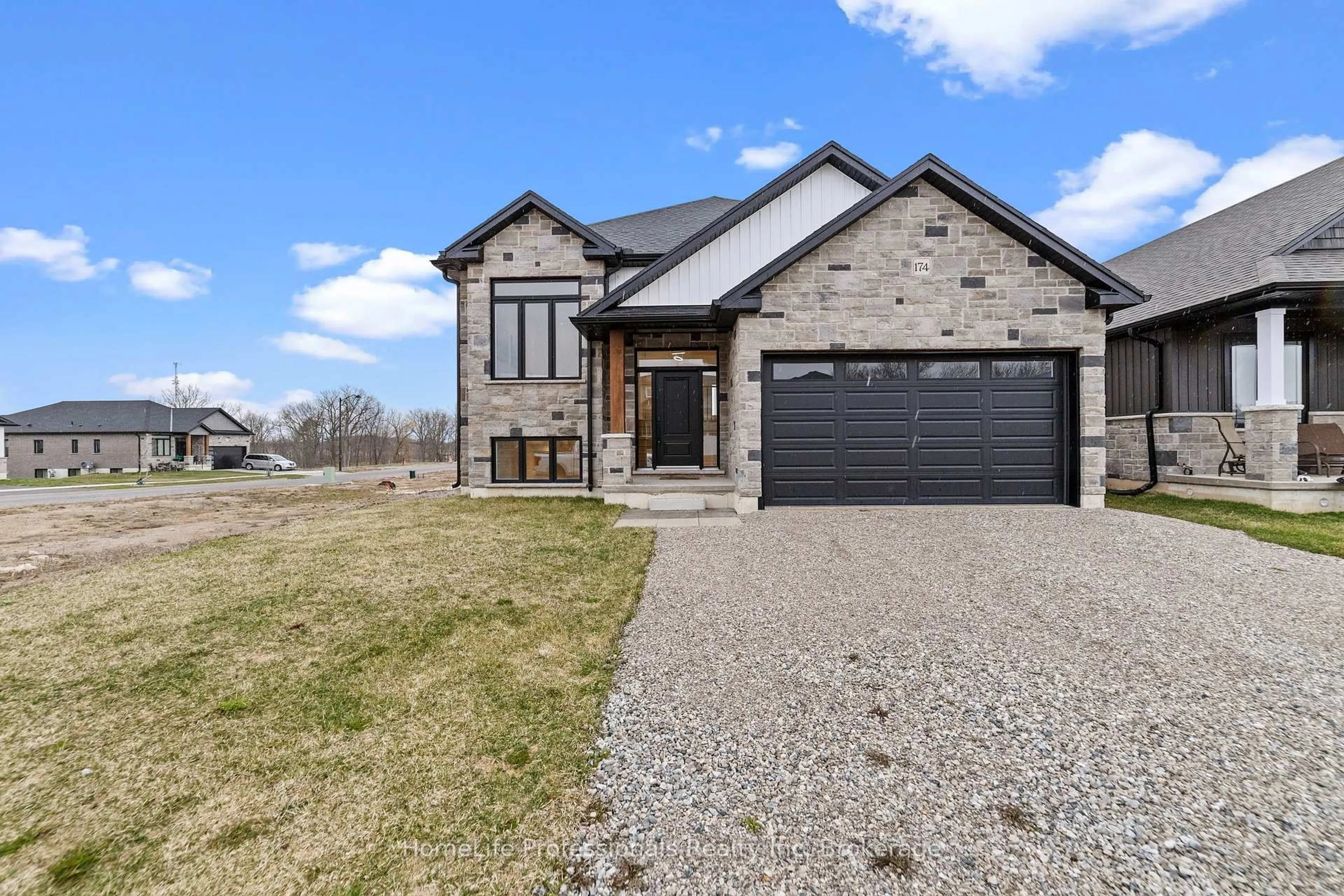 Home with brick exterior material, street for 174 PIKE CREEK Dr, Haldimand Ontario N0A 1E0