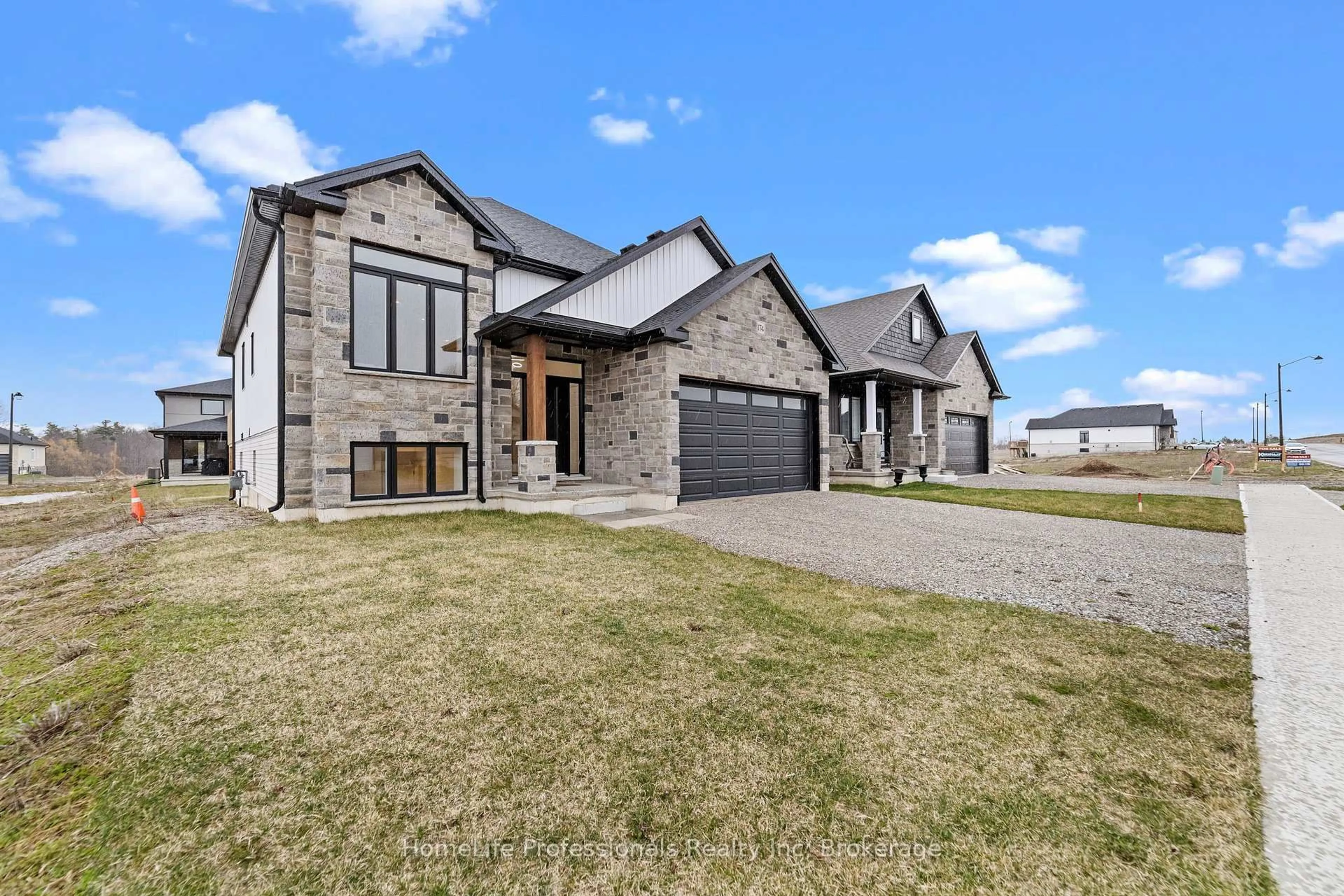 Home with brick exterior material, street for 174 PIKE CREEK Dr, Haldimand Ontario N0A 1E0