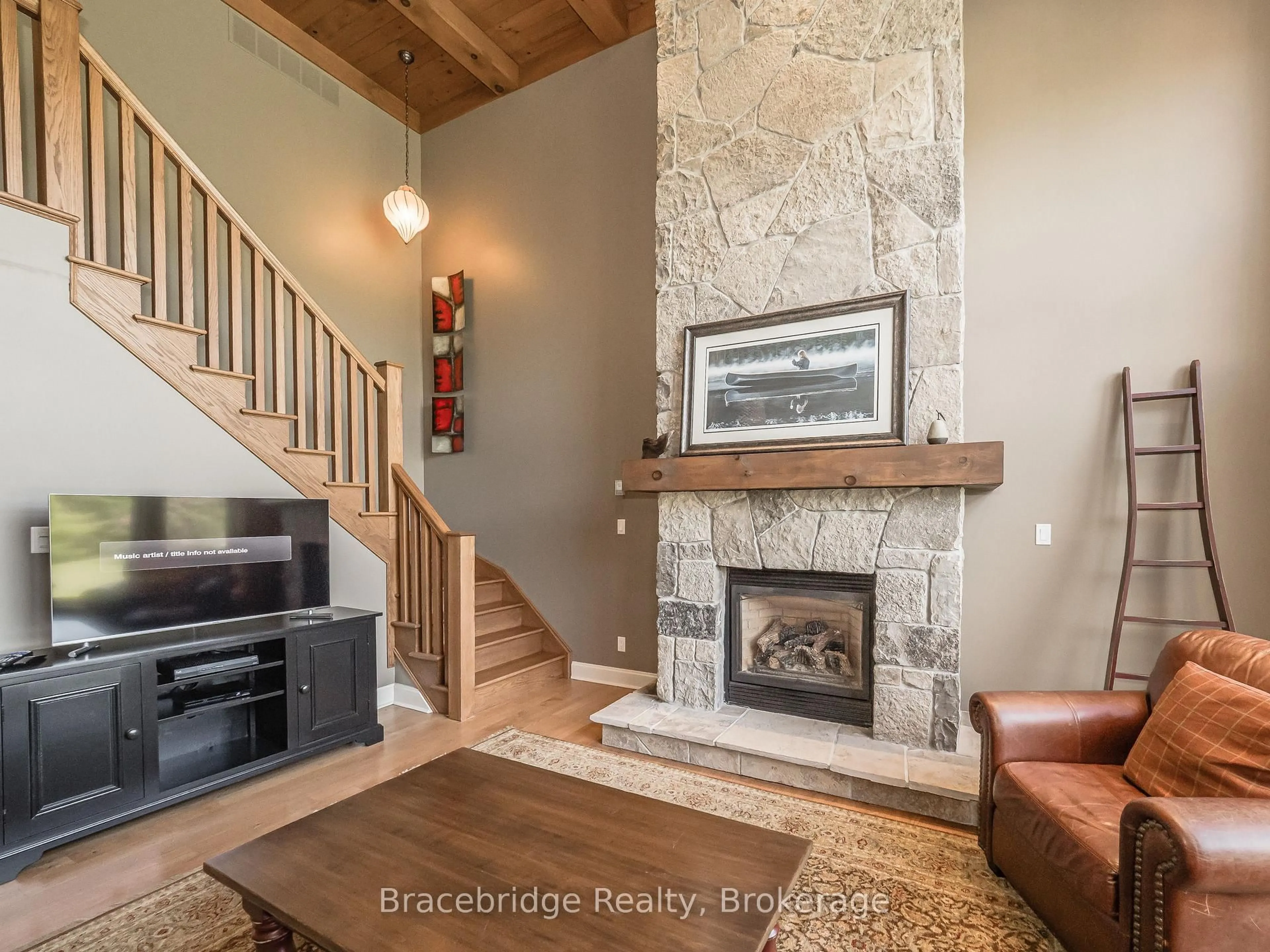 Living room with furniture, unknown for 3876 Muskoka Rd 118 Highway #Sandfield 4 W1, Muskoka Lakes Ontario P0B 1J0