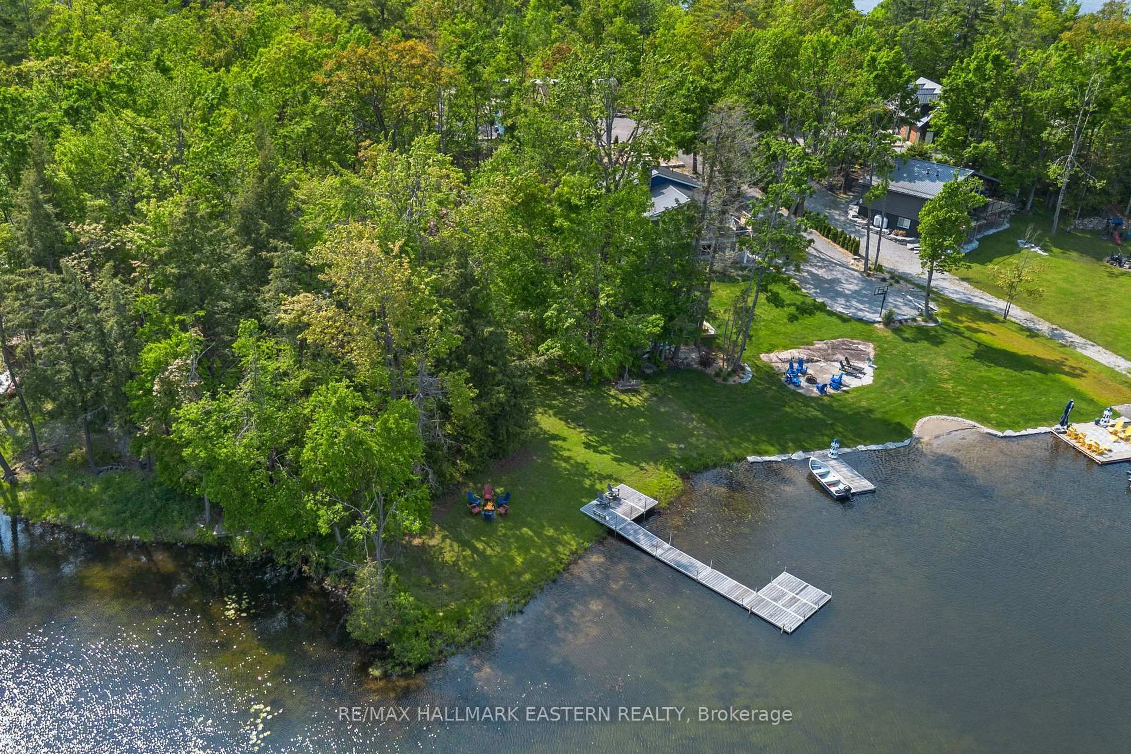 A pic from outside/outdoor area/front of a property/back of a property/a pic from drone, water/lake/river/ocean view for 68 Irwin Dr, Trent Lakes Ontario K0L 1J0