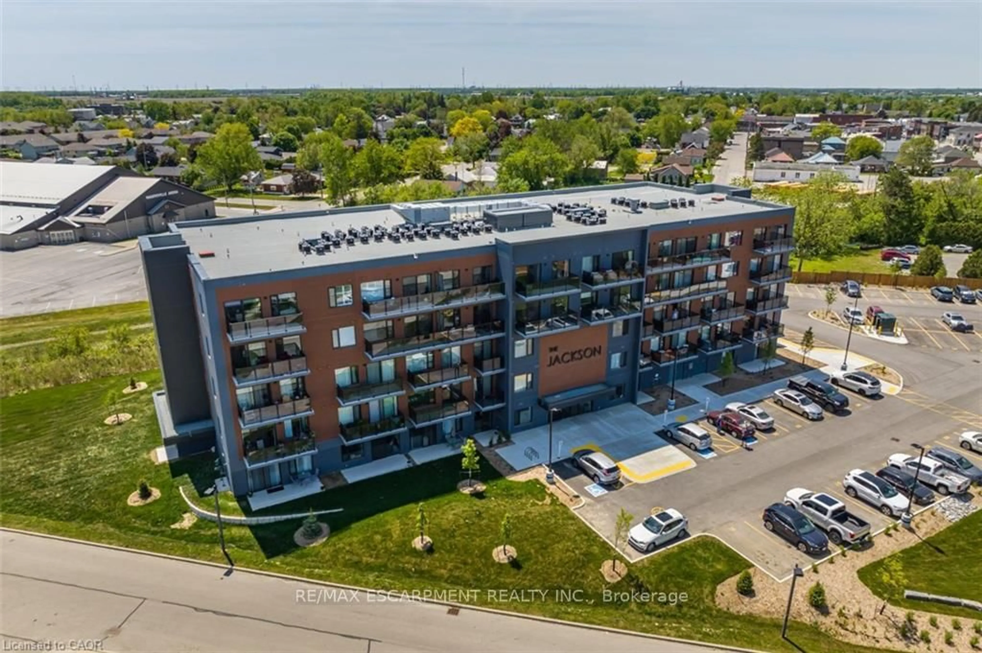 A pic from outside/outdoor area/front of a property/back of a property/a pic from drone, building for 64 Main St #305, Haldimand Ontario N0A 1H0