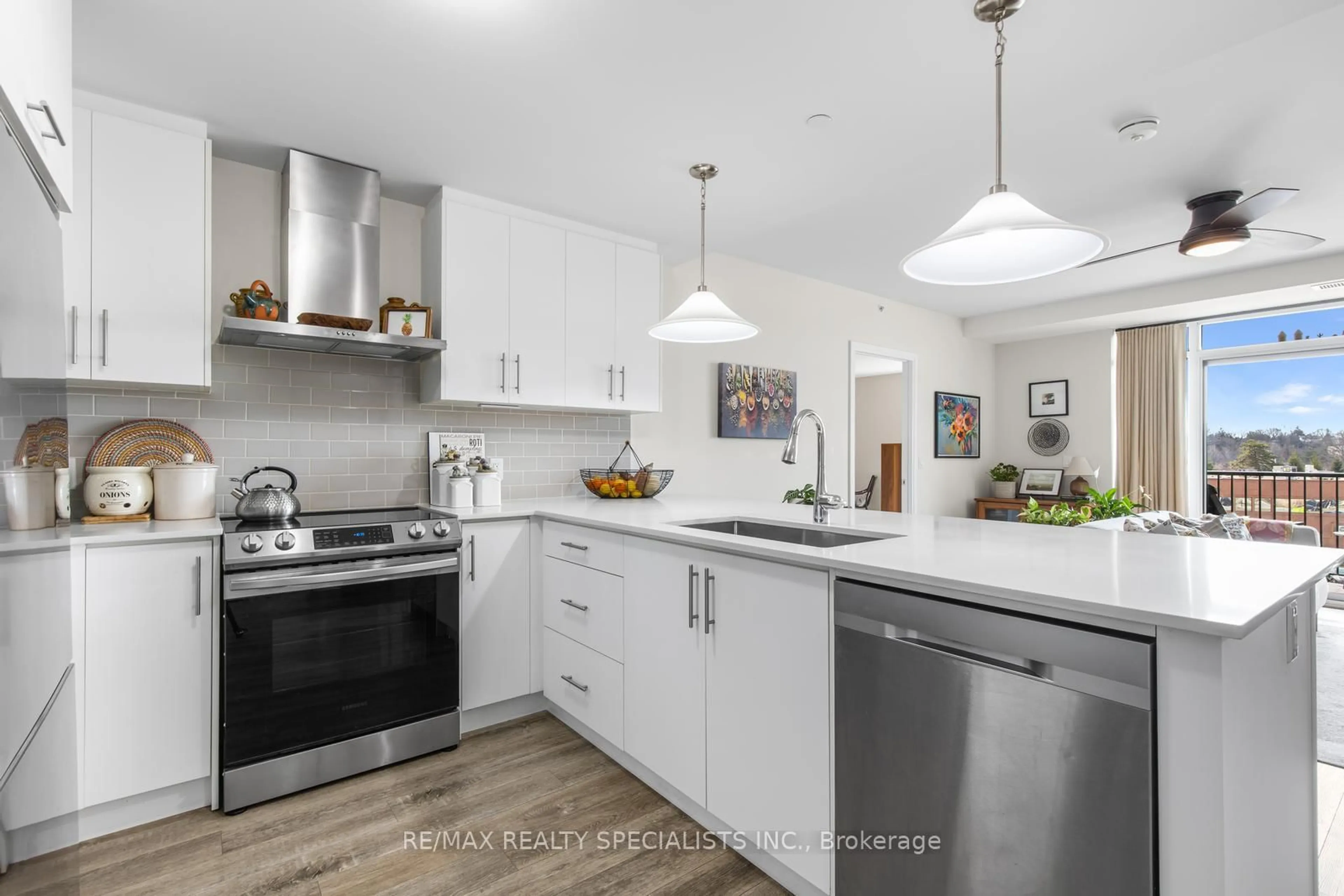 Open concept kitchen, ceramic/tile floor for 1 Redfern Ave #309, Hamilton Ontario L9C 0E6