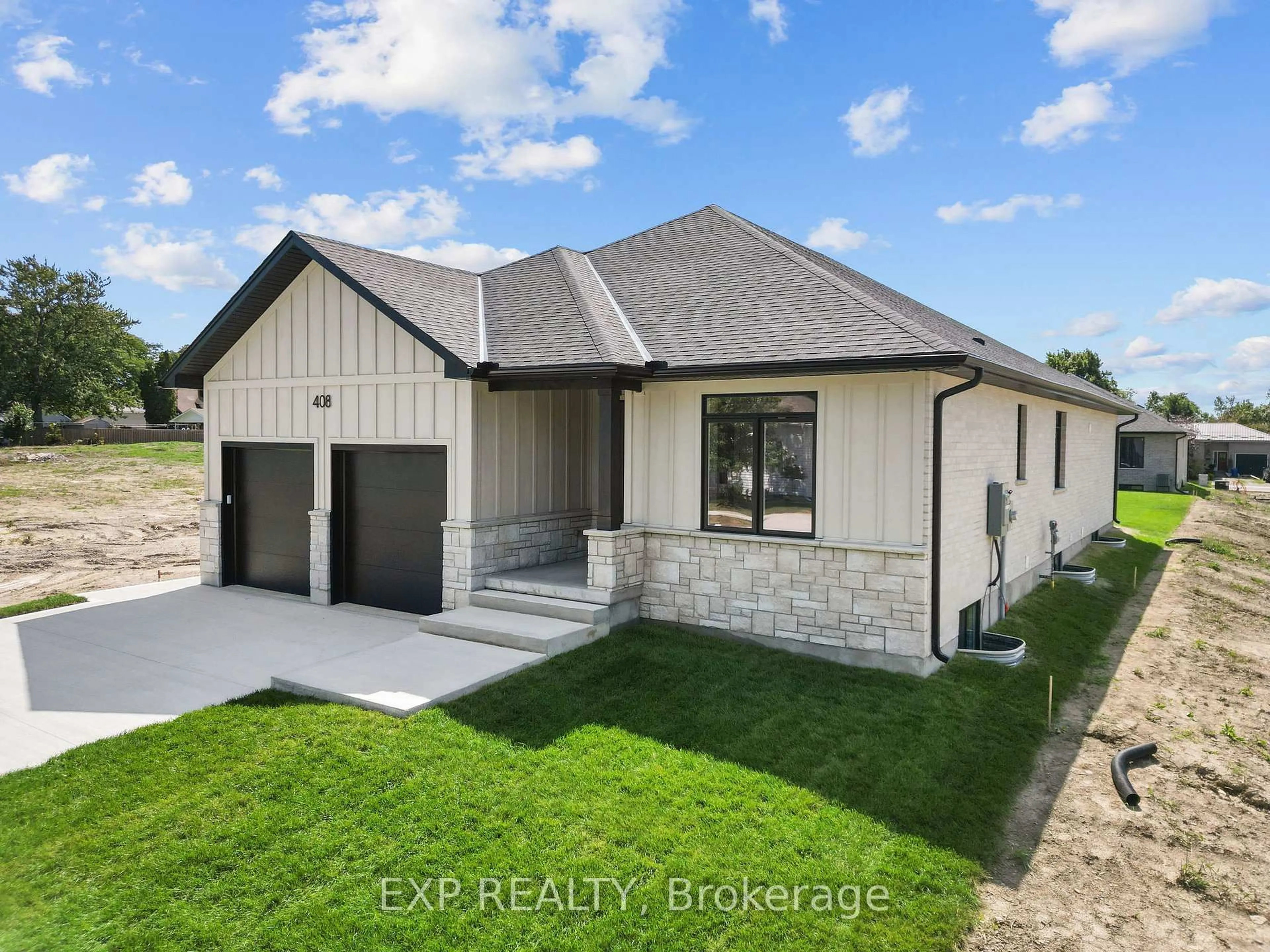 Home with brick exterior material, street for 420 Erie St, Warwick Ontario N0M 2S0