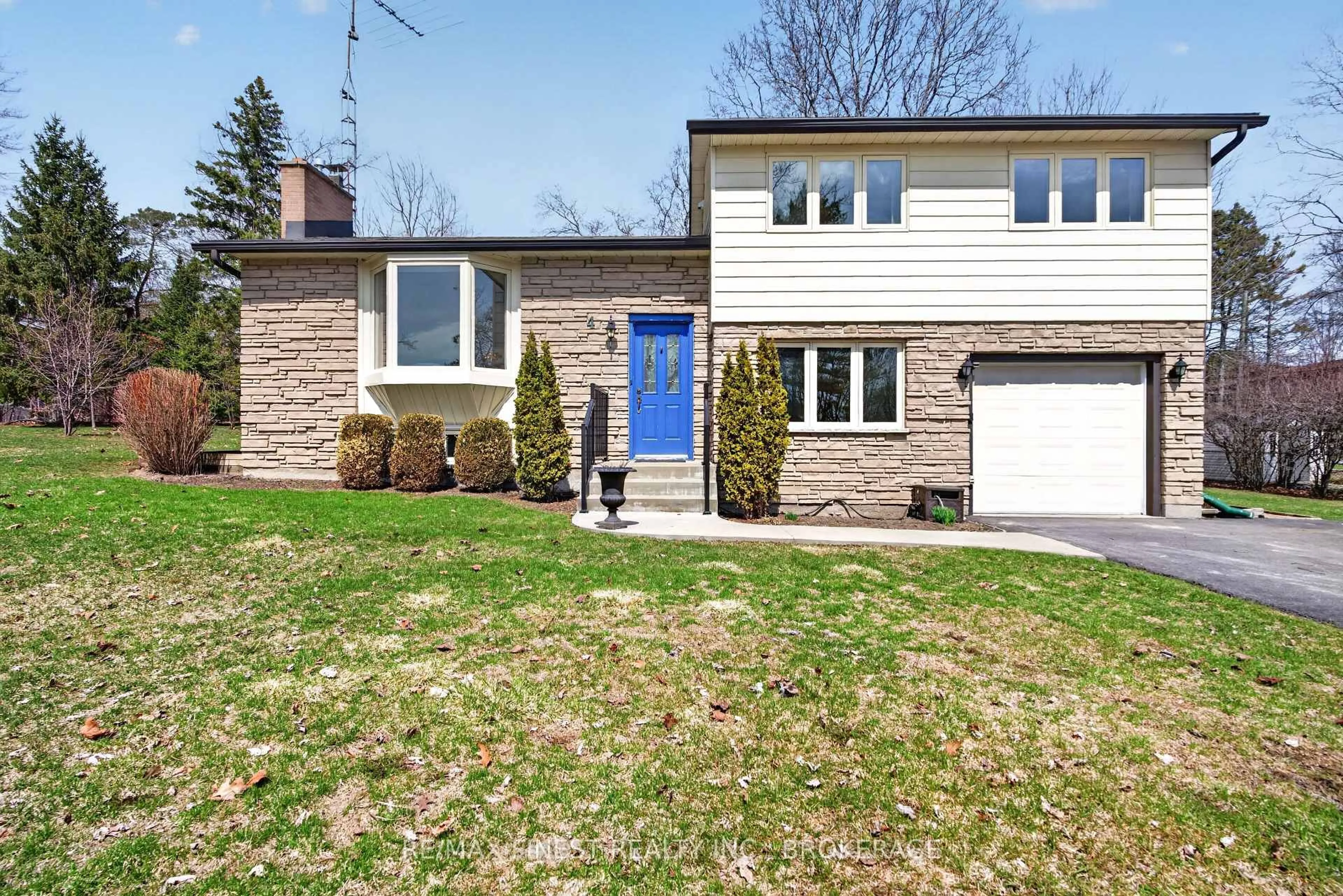 Home with brick exterior material, street for 4 Edgewood Rd, Bath Ontario K0H 1G0