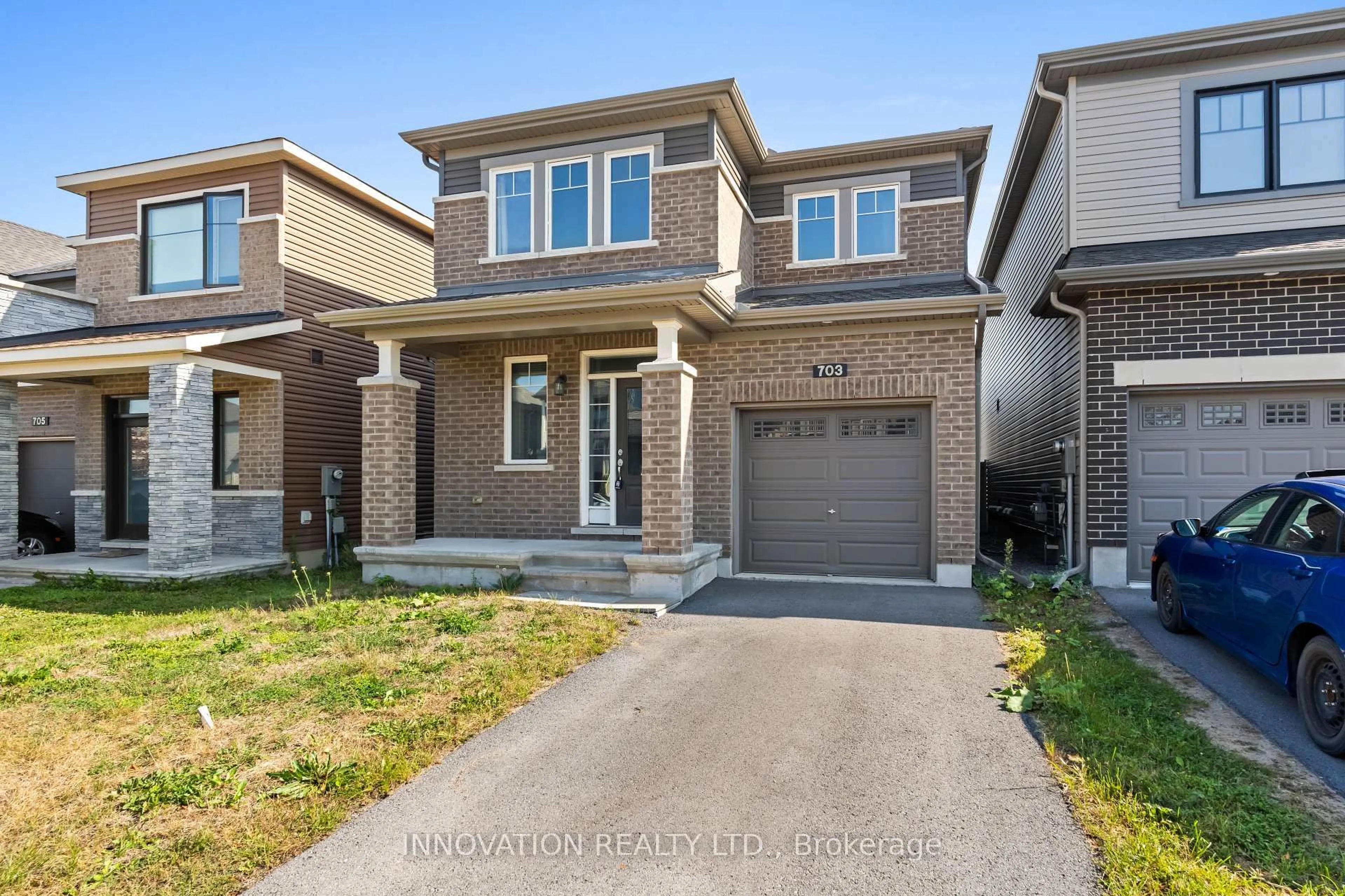 Home with brick exterior material, street for 703 Samantha Eastop Ave, Ottawa Ontario K2S 1B9