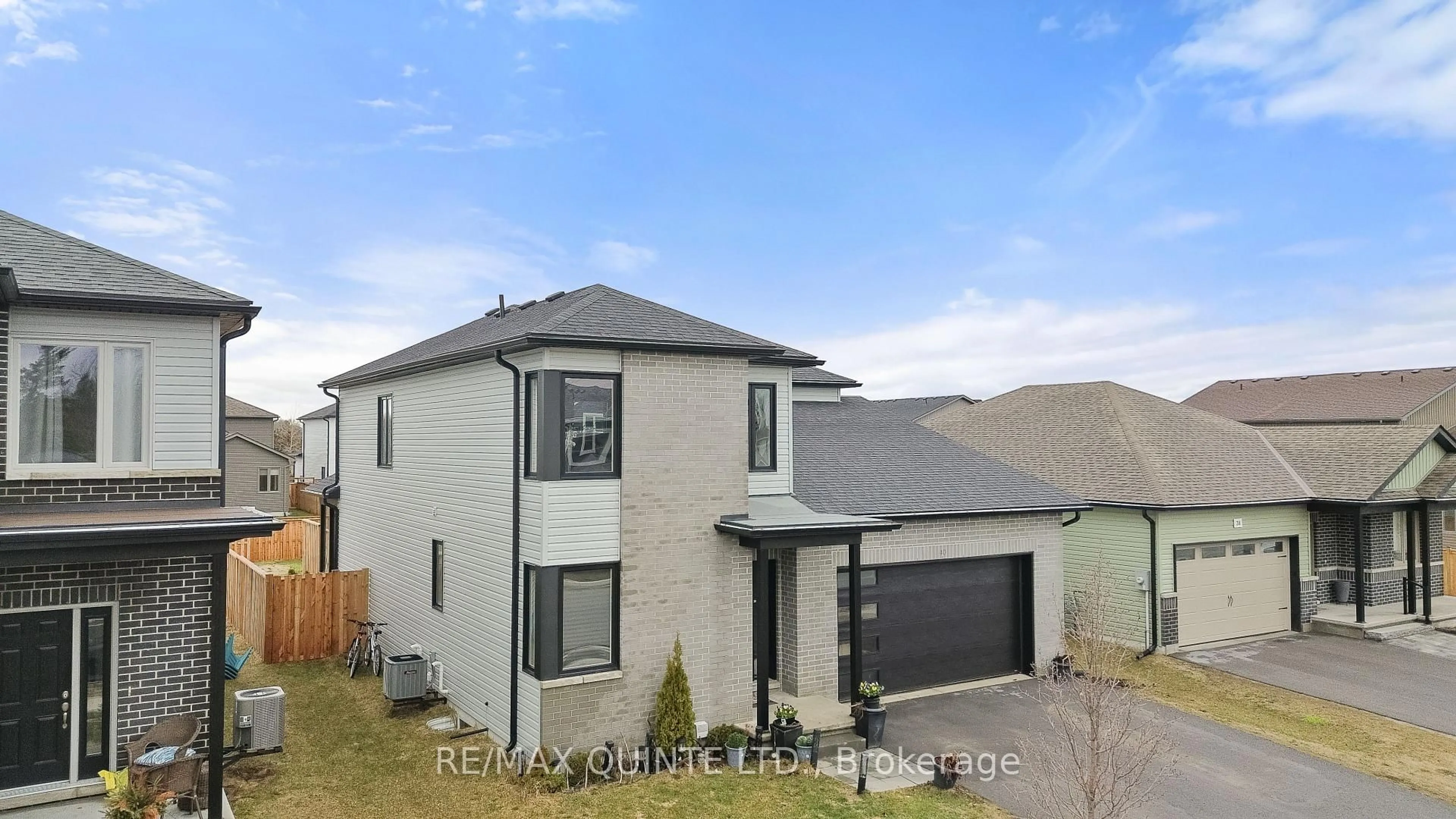 A pic from outside/outdoor area/front of a property/back of a property/a pic from drone, street for 40 Allen St, Prince Edward County Ontario K0K 2T0