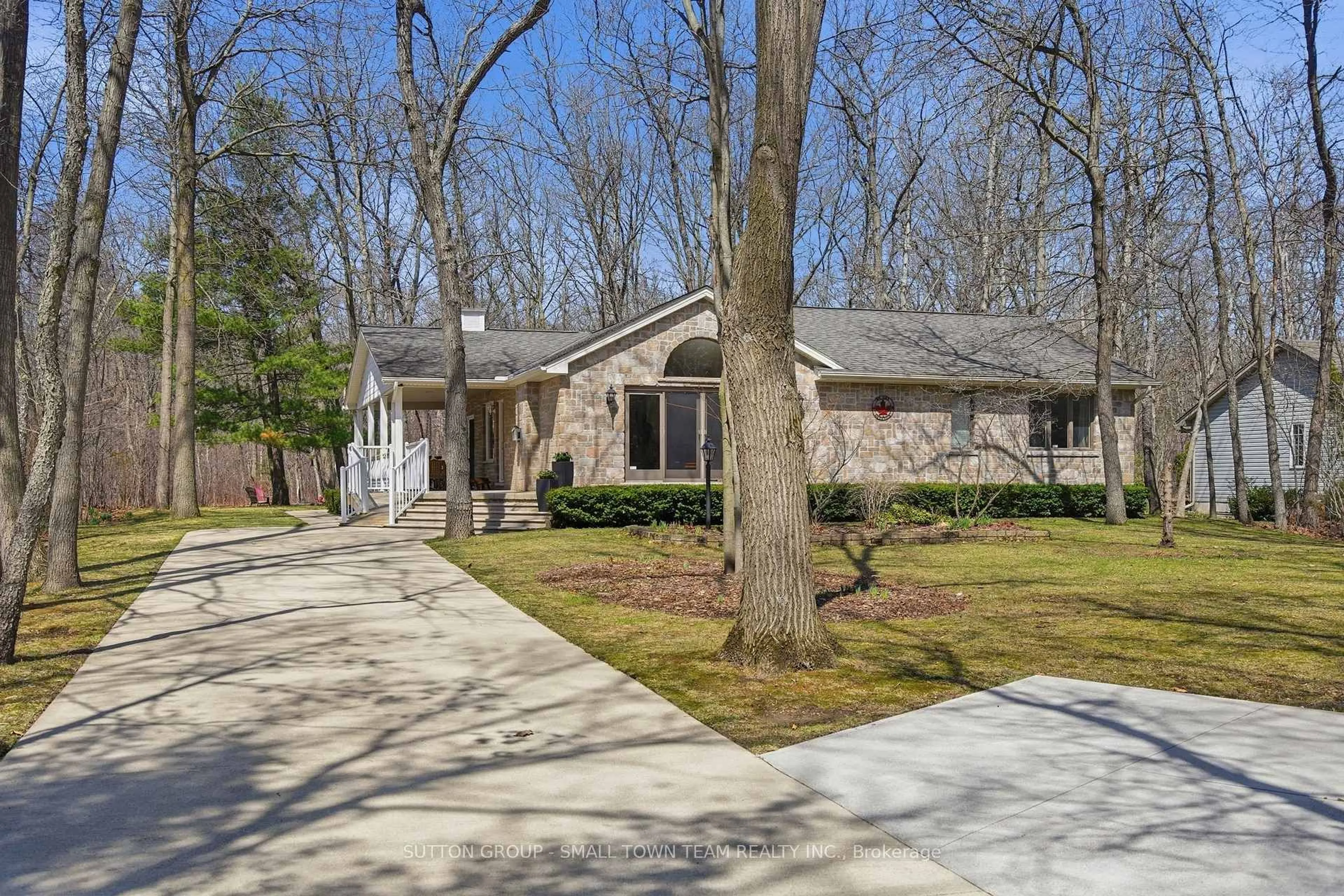 Home with brick exterior material, street for 8816 Timberwood Tr, Lambton Shores Ontario N0M 1T0