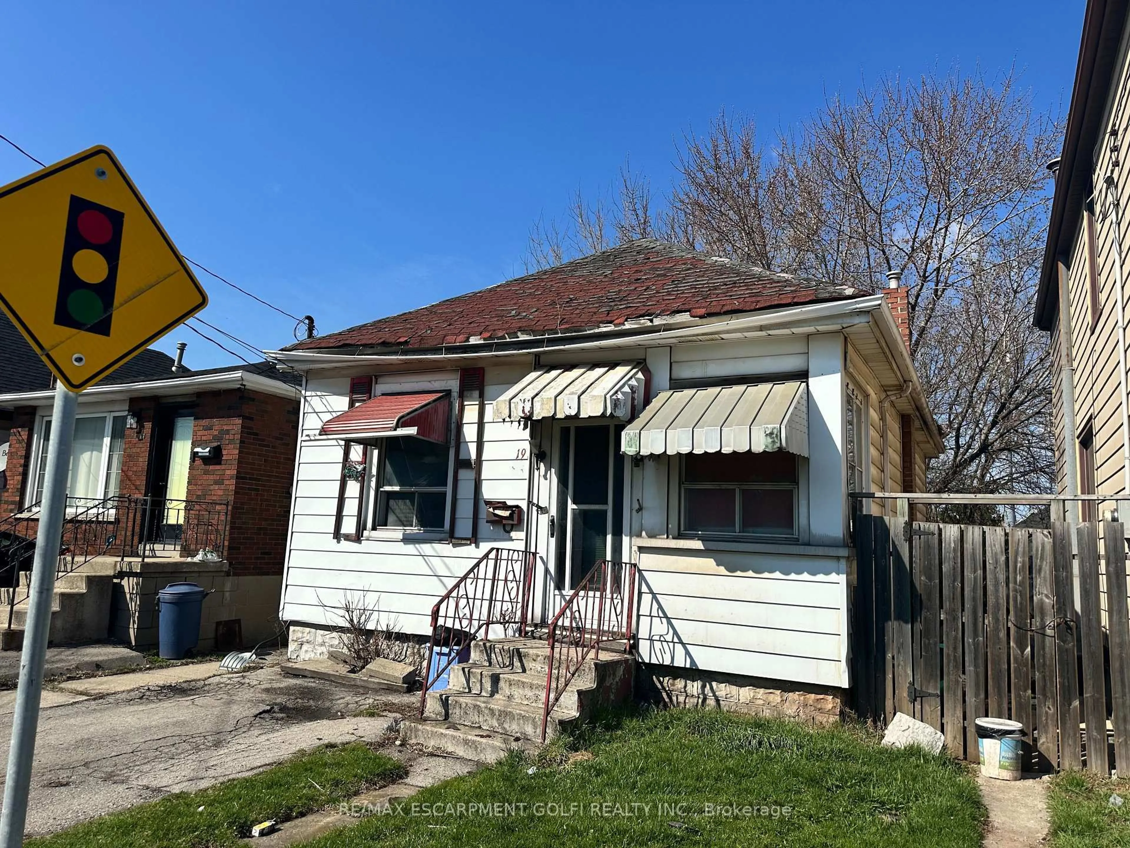 Home with brick exterior material, street for 19 Vansitmart Ave, Hamilton Ontario L8H 3A2