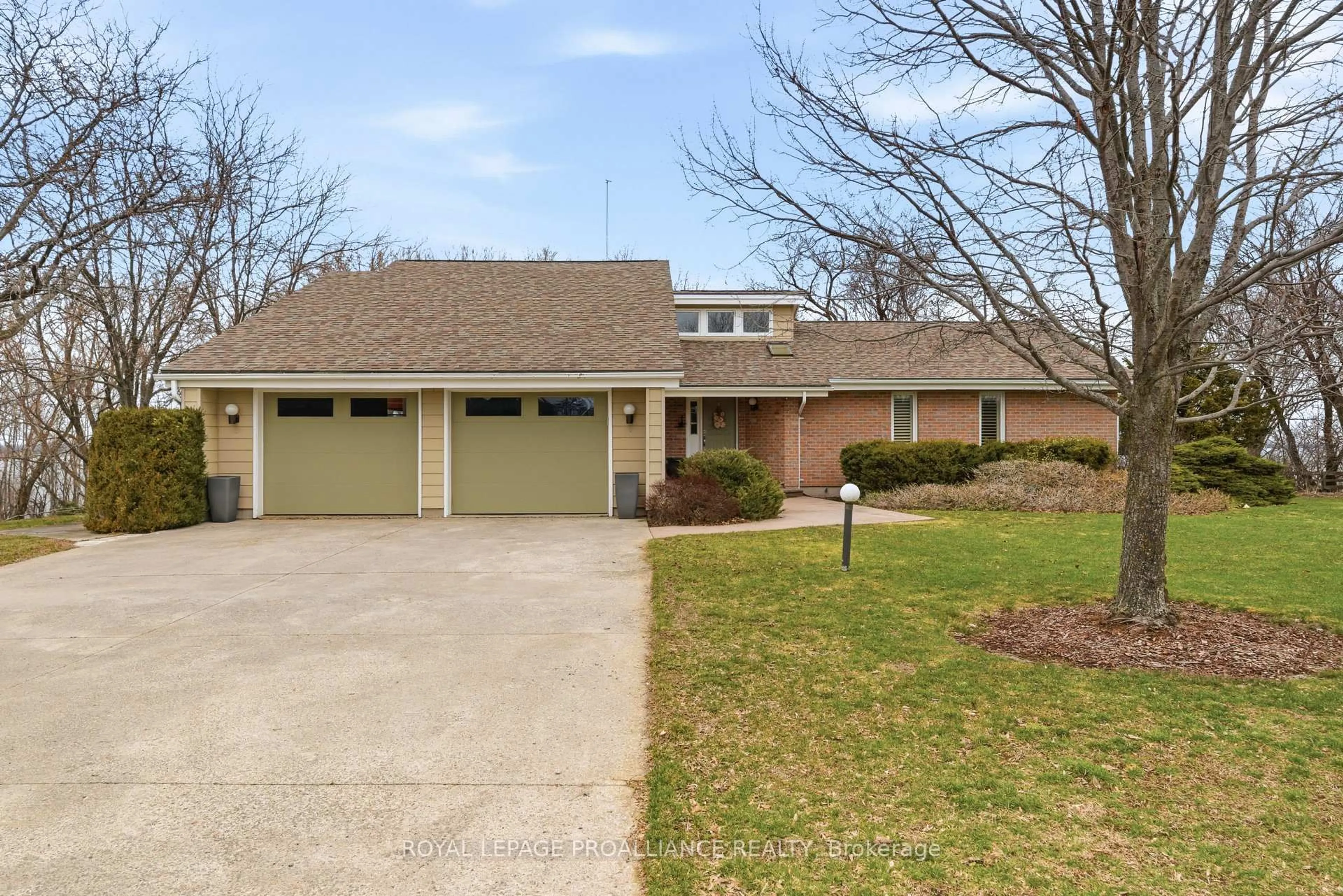 Home with brick exterior material, street for 1544 County Road 14, Prince Edward County Ontario K0K 1A0