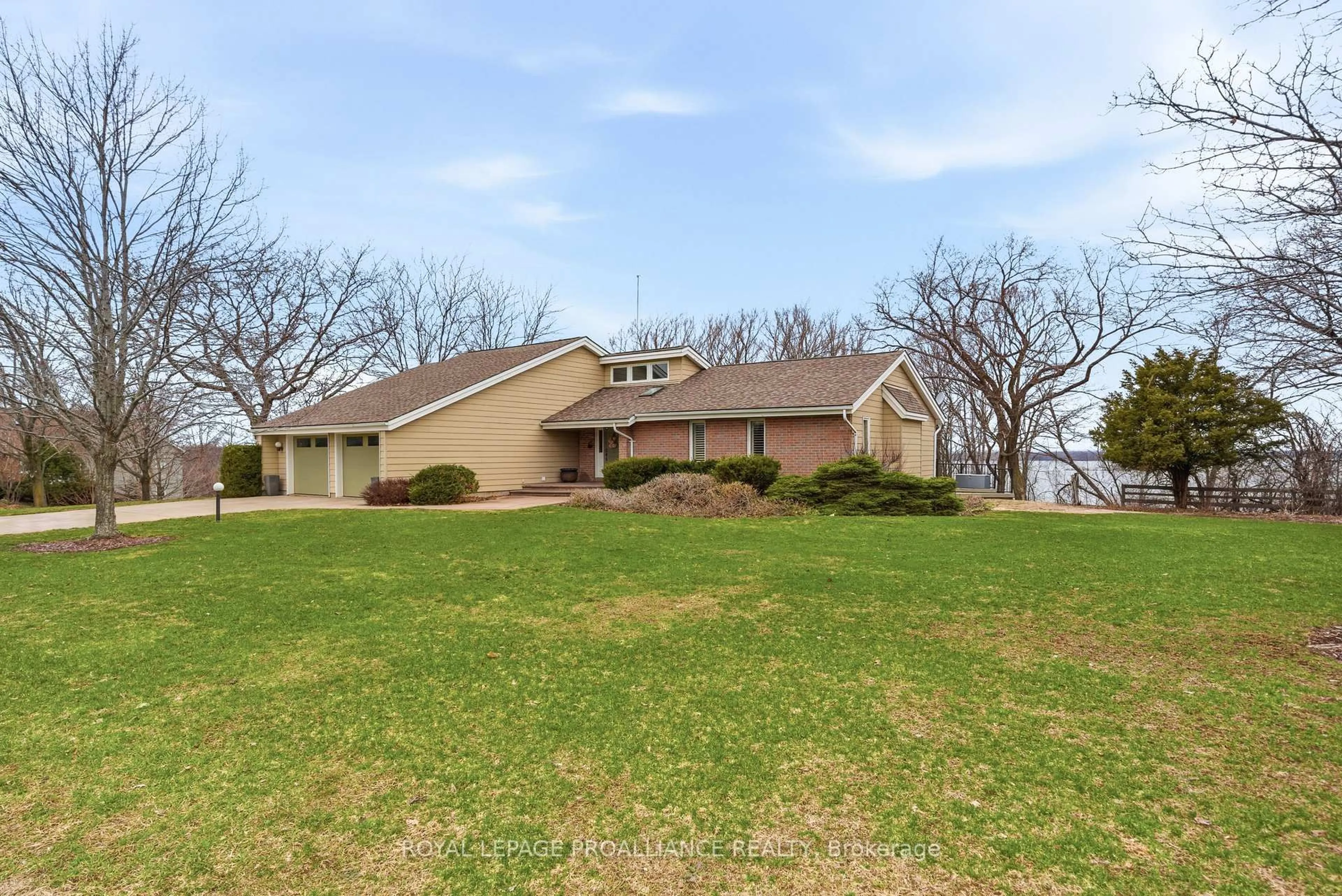 A pic from outside/outdoor area/front of a property/back of a property/a pic from drone, unknown for 1544 County Road 14, Prince Edward County Ontario K0K 1A0