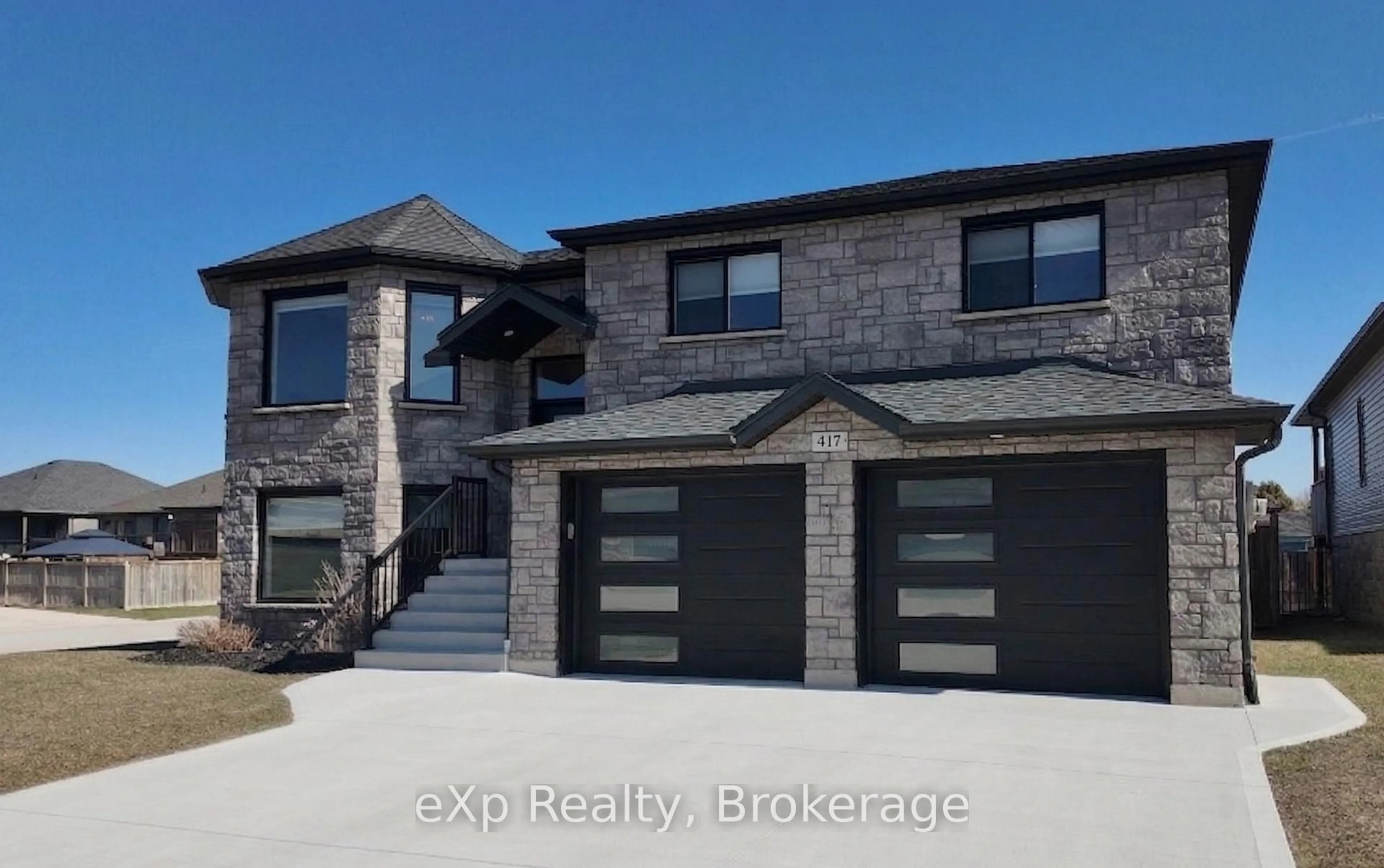 Home with brick exterior material, street for 417 Buckby Lane, Saugeen Shores Ontario N0H 2C1