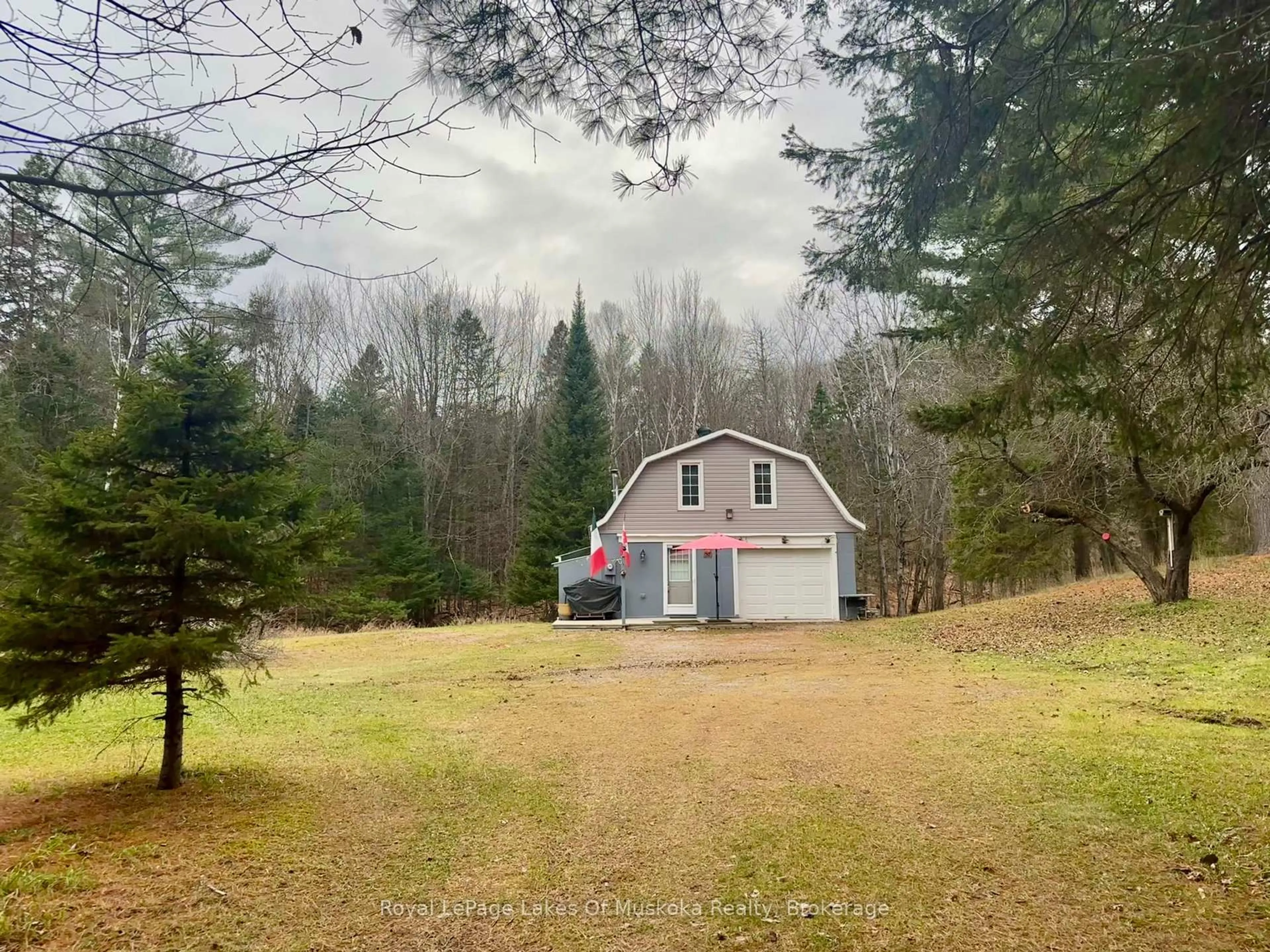 A pic from outside/outdoor area/front of a property/back of a property/a pic from drone, forest/trees view for 112 510 Highway, Magnetawan Ontario P0A 1P0