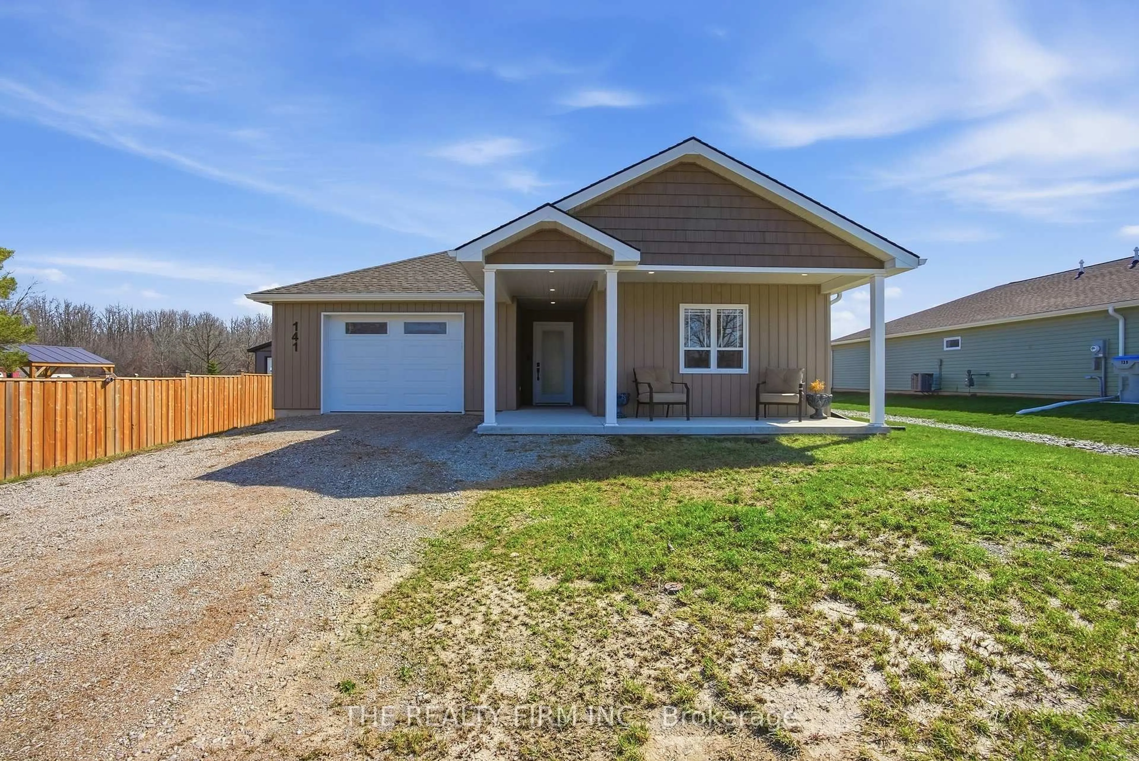 Home with vinyl exterior material, street for 141 Victoria Ave, South Huron Ontario N0M 1M0