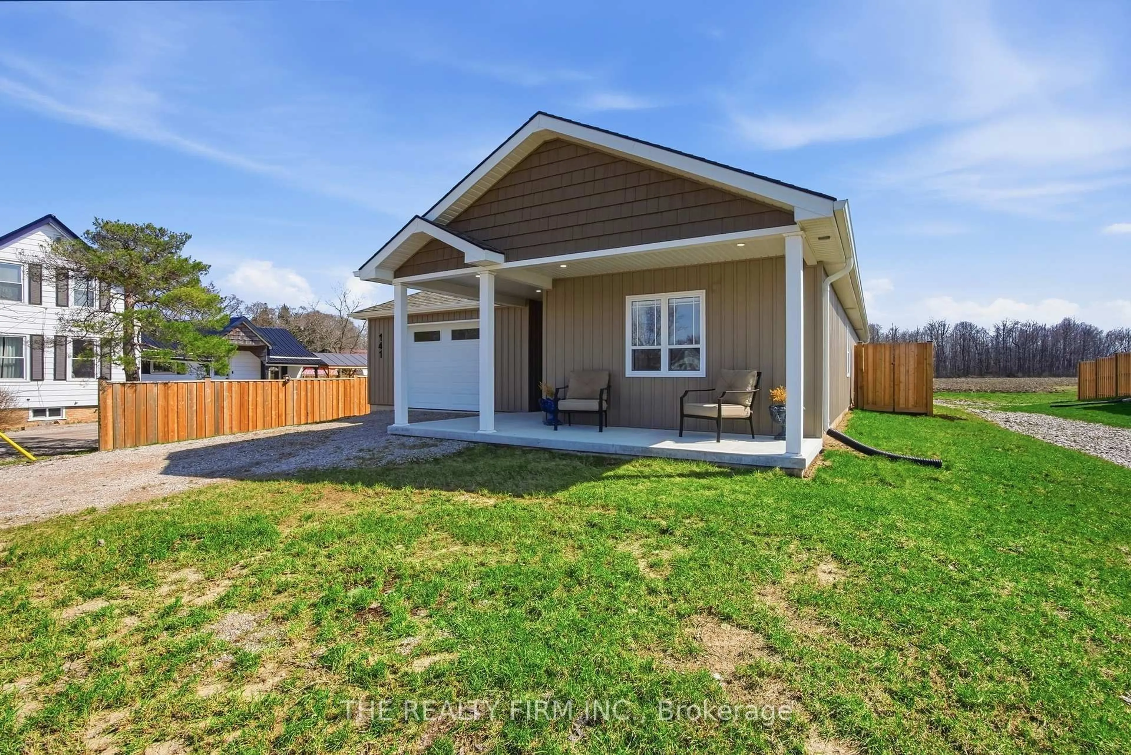Home with vinyl exterior material, street for 141 Victoria Ave, South Huron Ontario N0M 1M0