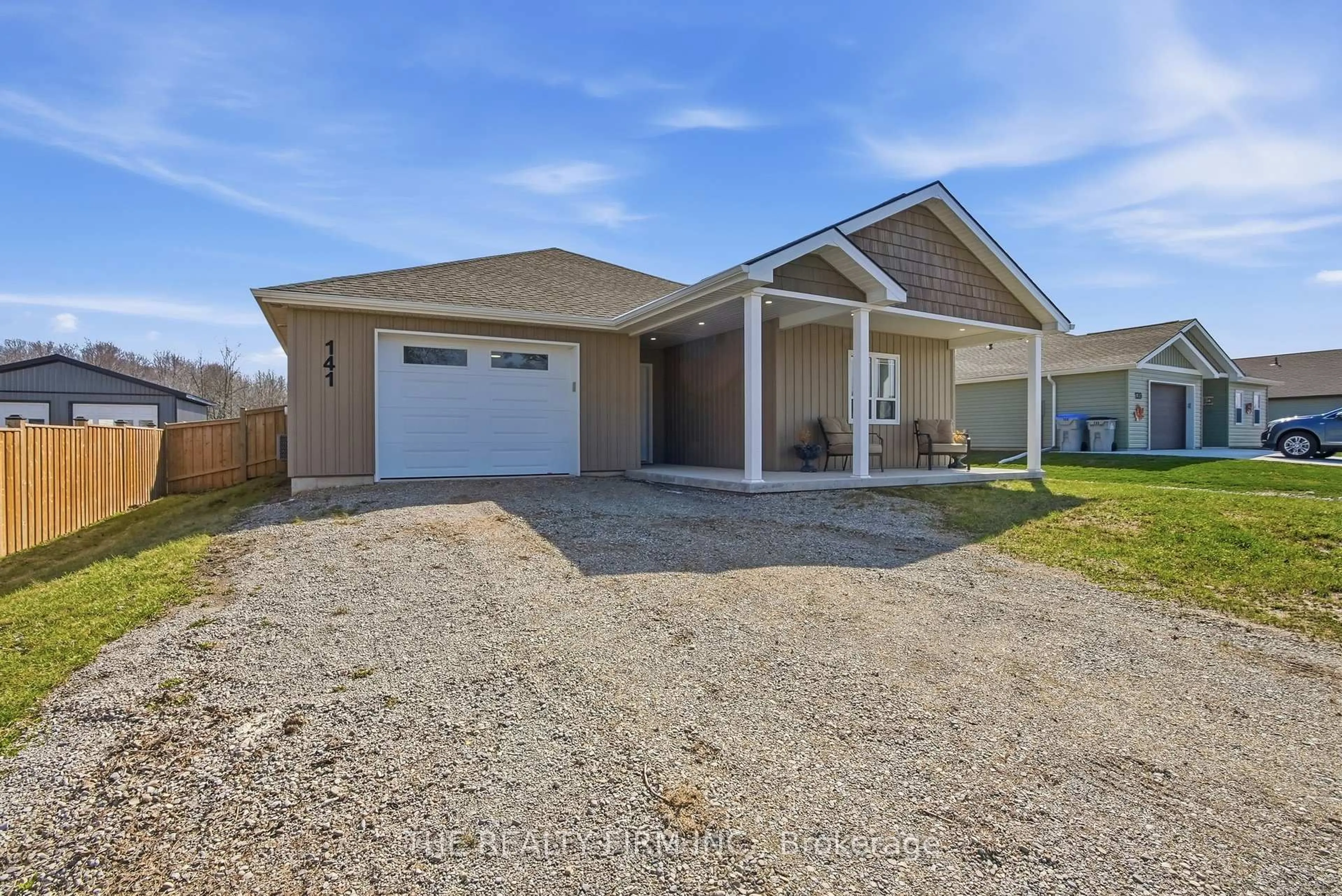 Home with vinyl exterior material, street for 141 Victoria Ave, South Huron Ontario N0M 1M0