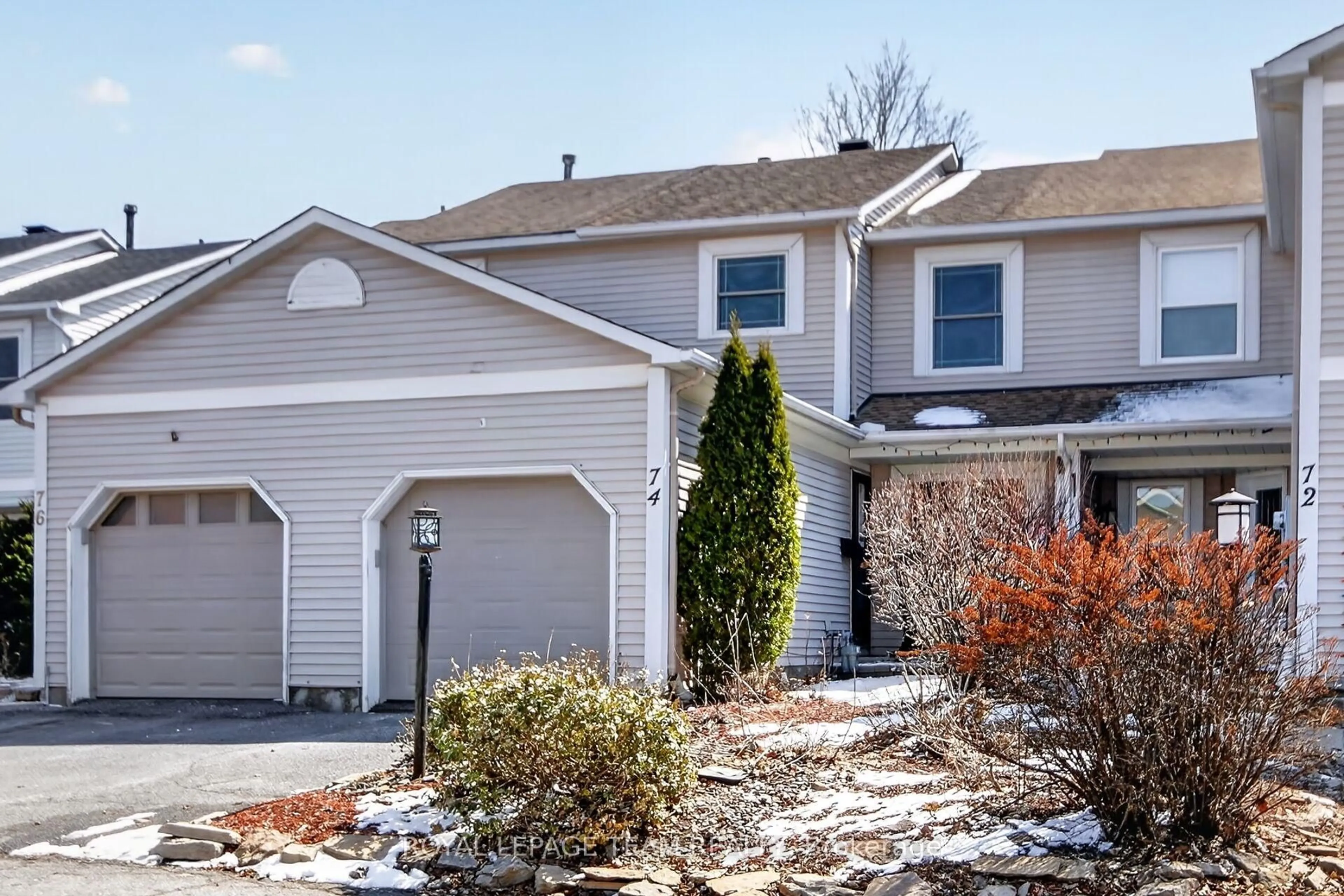 Home with vinyl exterior material, street for 74 Palomino Dr, Ottawa Ontario K2M 1N2