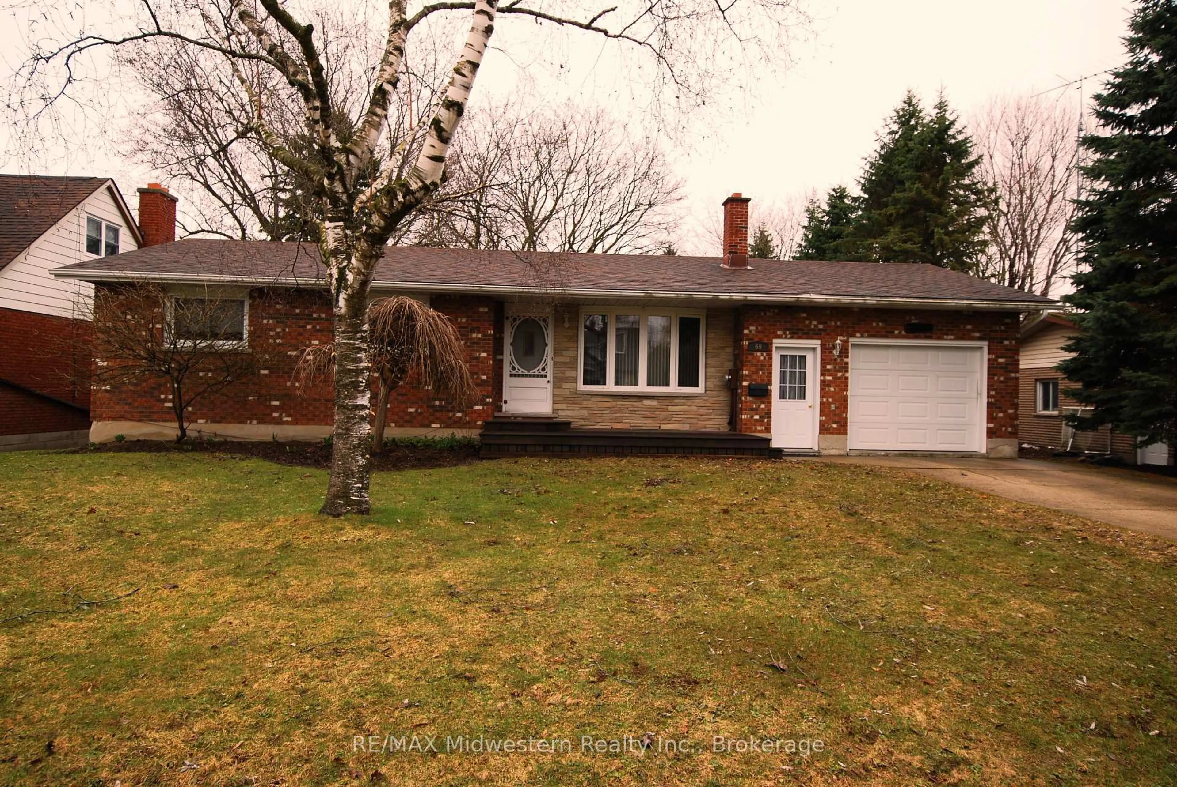 Home with brick exterior material, street for 69 Louise St, Minto Ontario N0G 1Z0