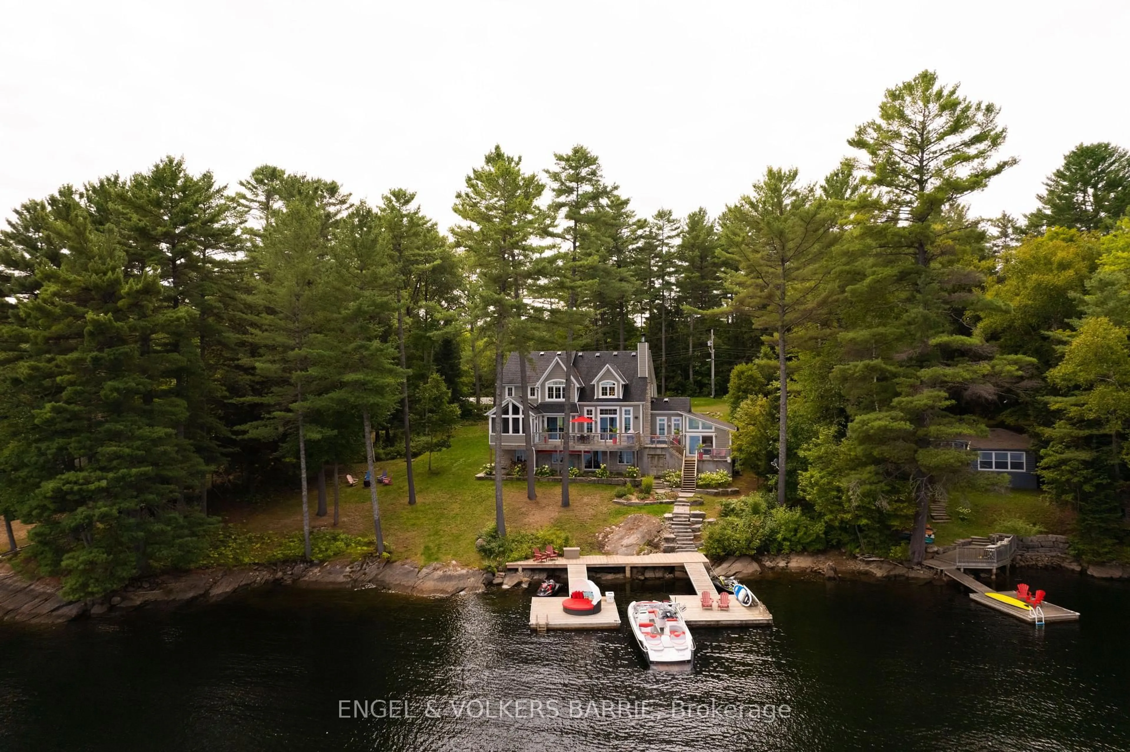 A pic from outside/outdoor area/front of a property/back of a property/a pic from drone, water/lake/river/ocean view for 1043 Fortunes Tr, Algonquin Highlands Ontario K0M 1S0