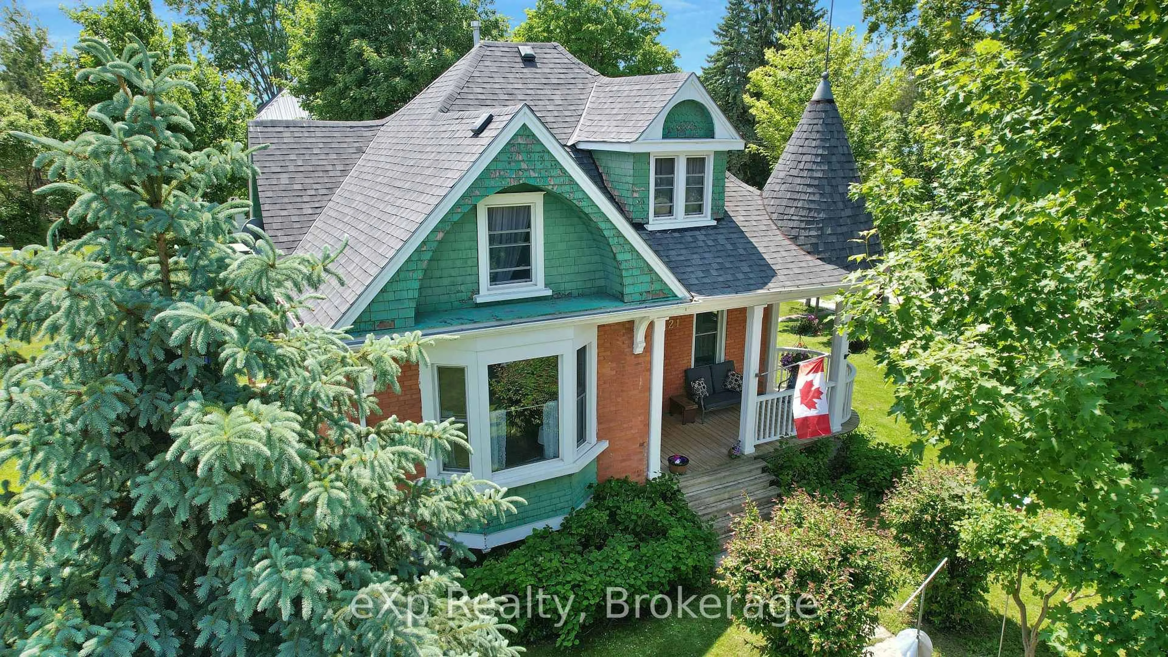 A pic from outside/outdoor area/front of a property/back of a property/a pic from drone, street for 21 William St, Minto Ontario N0G 1M0