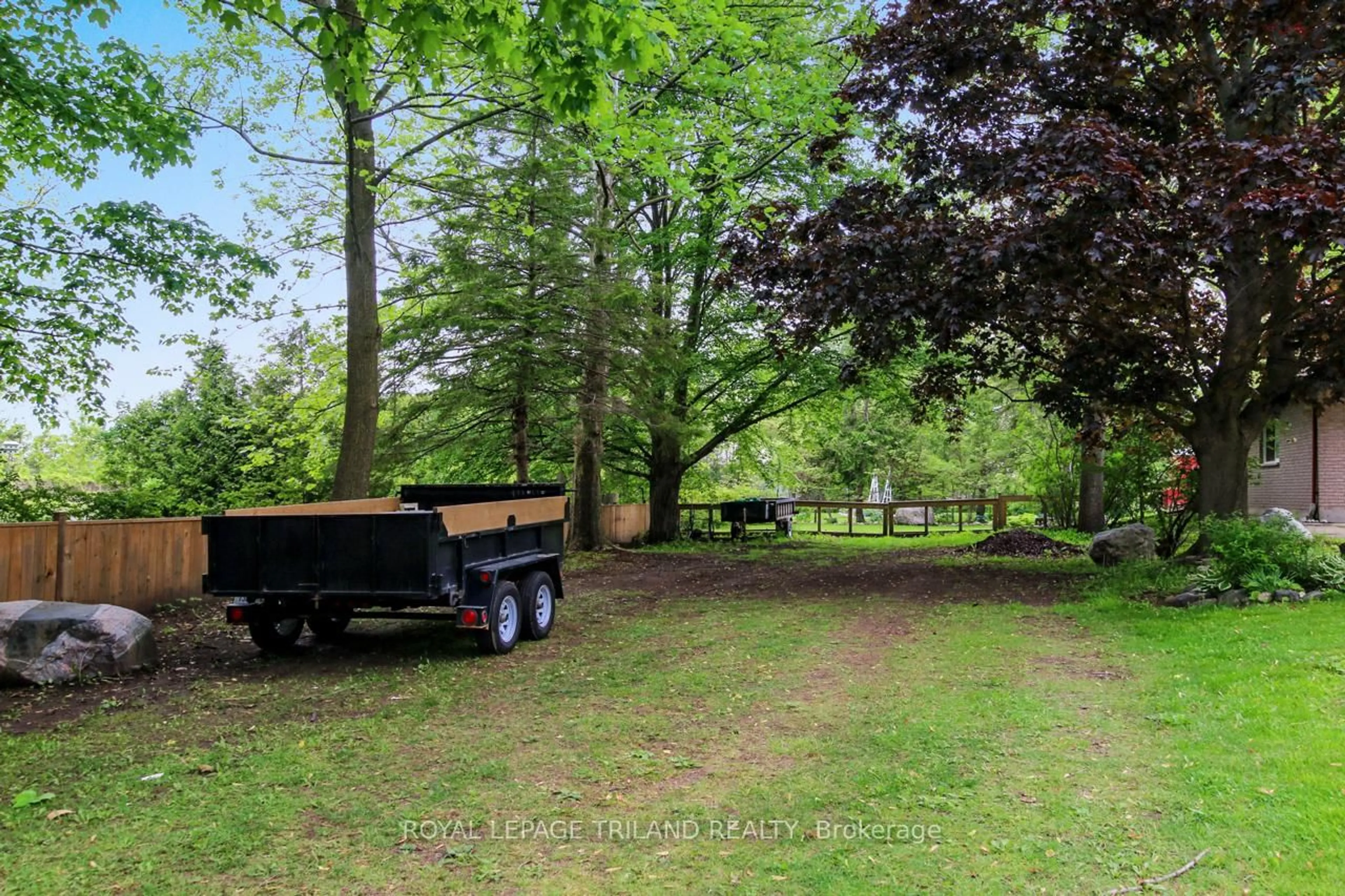 A pic from outside/outdoor area/front of a property/back of a property/a pic from drone, forest/trees view for 9460 Currie Rd, Dutton/Dunwich Ontario N0L 2M0