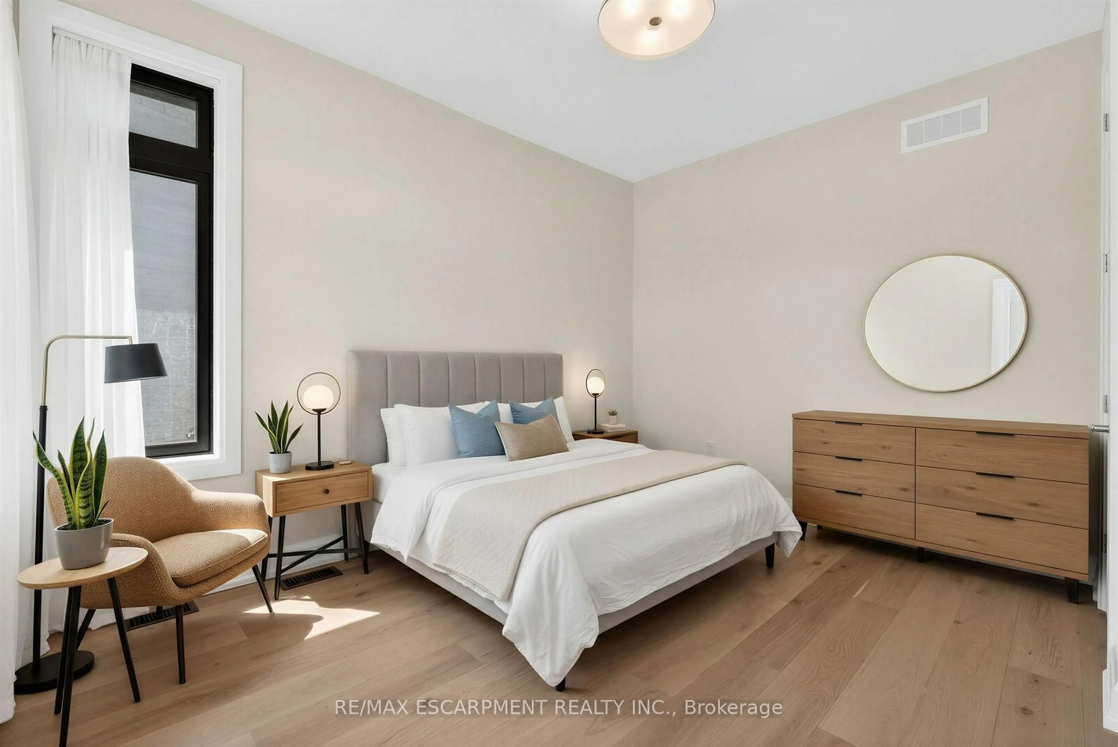 Bedroom with bed, wood/laminate floor for 6192 Curlin Cres, Niagara Falls Ontario L2H 3W8