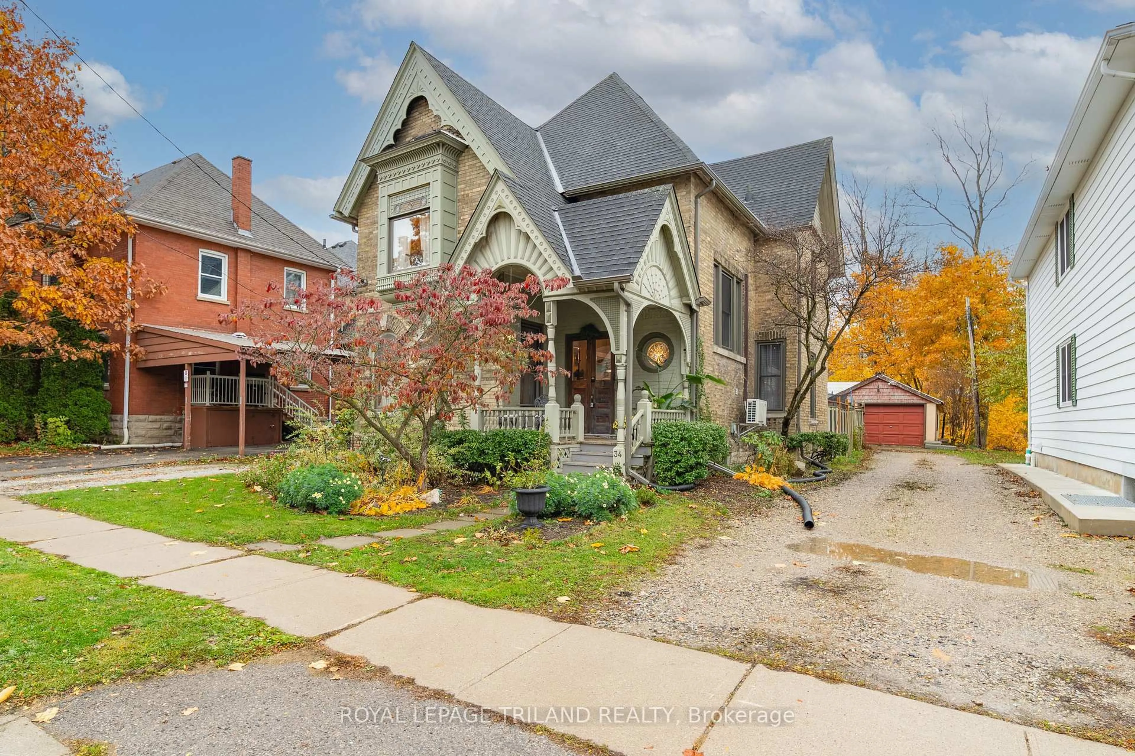Home with brick exterior material, street for 34 Gladstone Ave, St. Thomas Ontario N5R 2L4