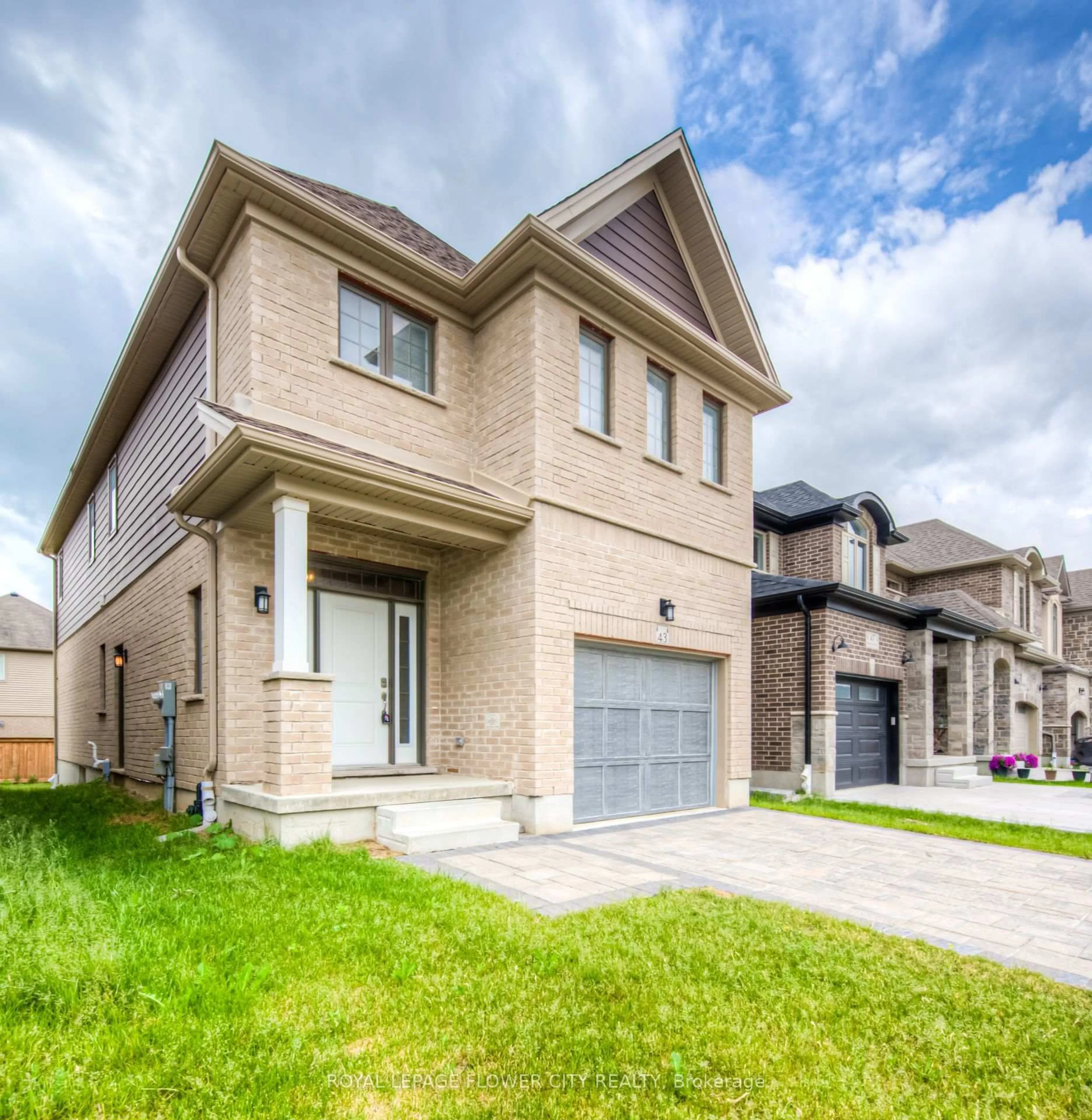 Home with brick exterior material, street for 43 Pondcliffe Dr, Kitchener Ontario N2R 0B5