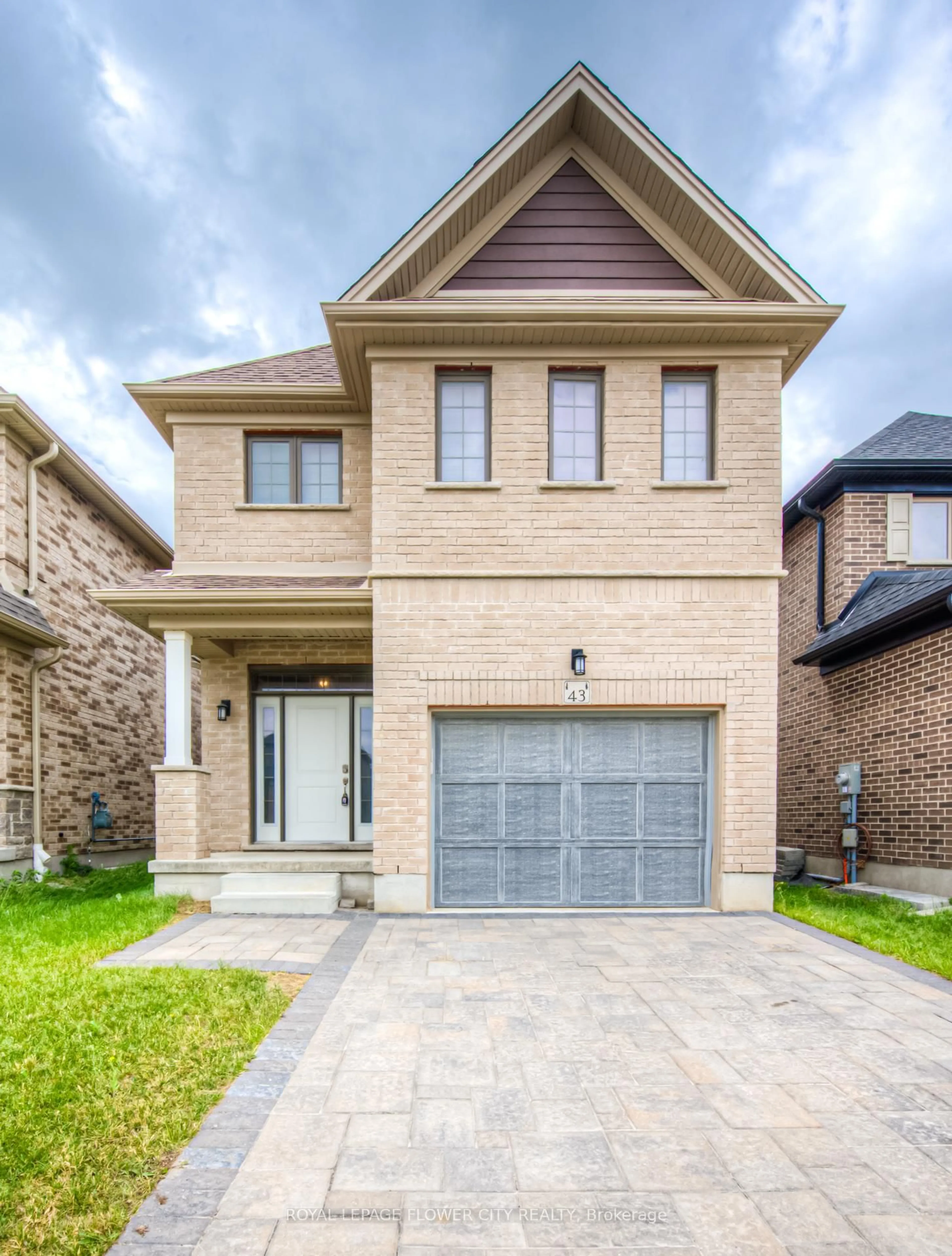 Home with brick exterior material, street for 43 Pondcliffe Dr, Kitchener Ontario N2R 0B5