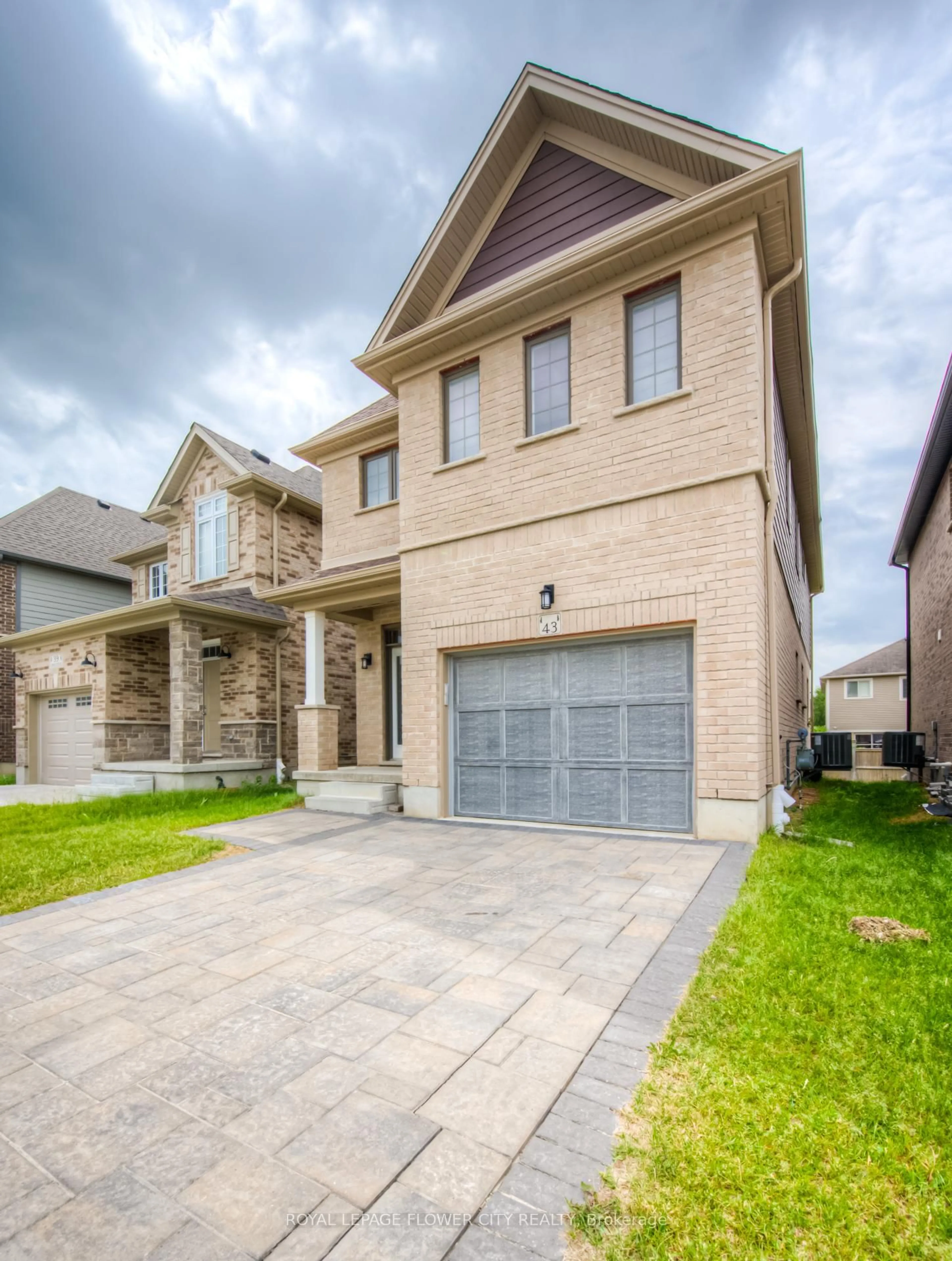 Home with brick exterior material, street for 43 Pondcliffe Dr, Kitchener Ontario N2R 0B5