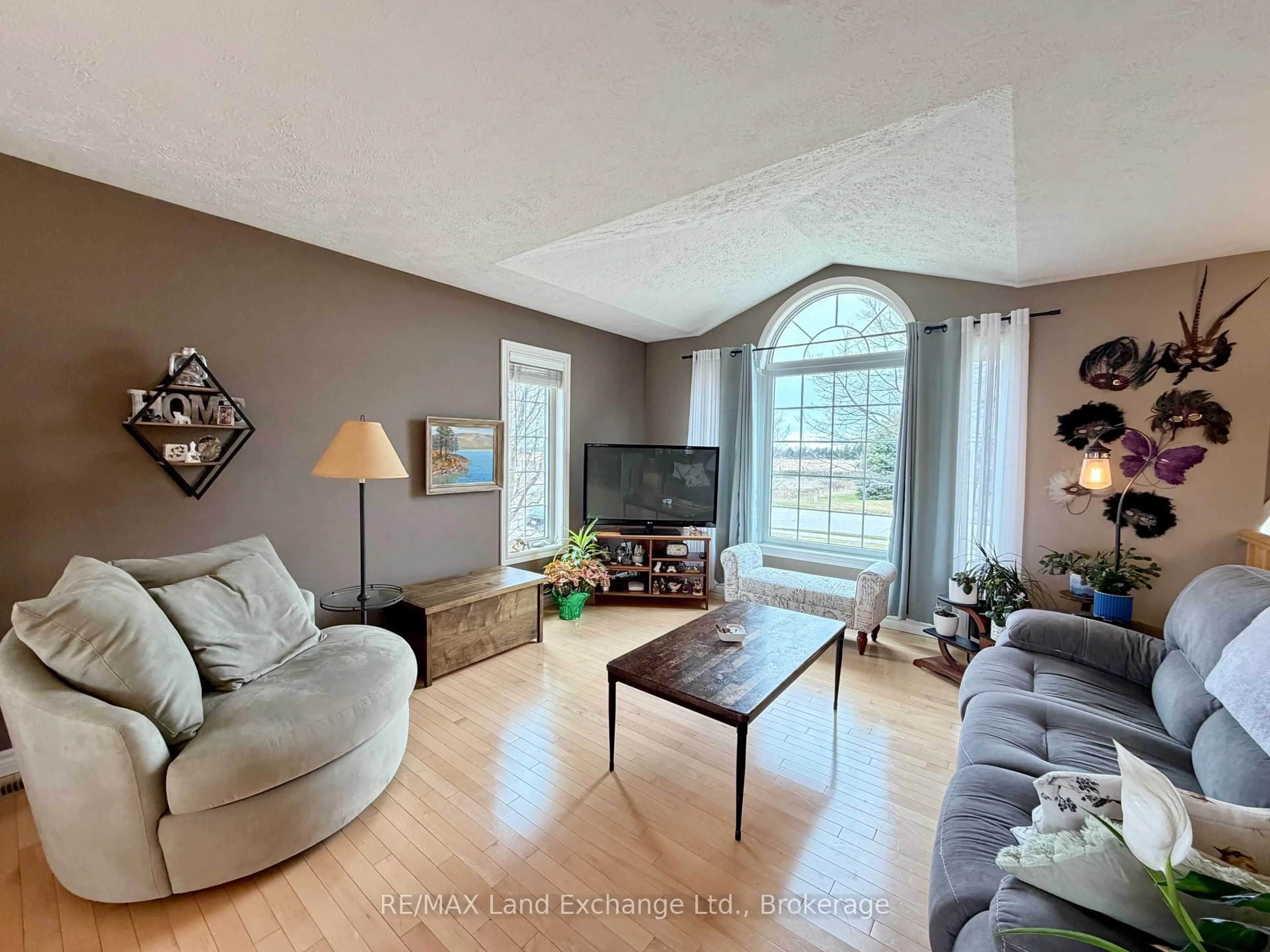 Living room with furniture, wood/laminate floor for 161 STICKEL St, Saugeen Shores Ontario N0H 2C1