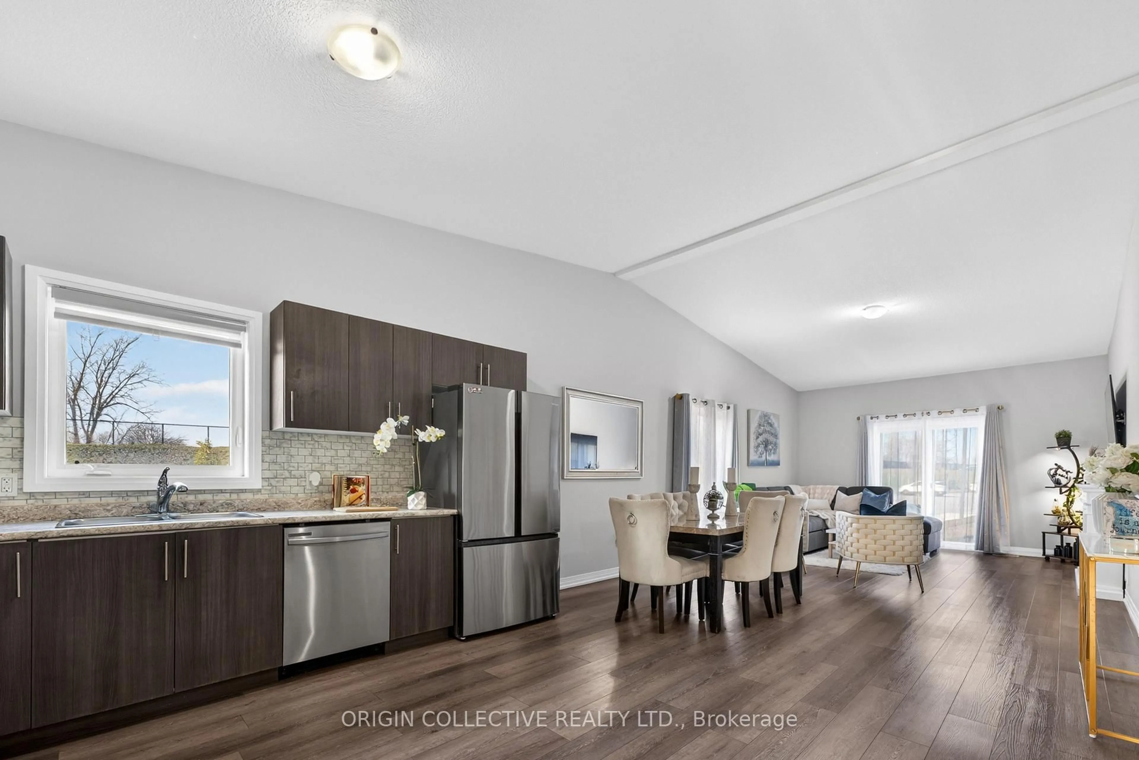 Open concept kitchen, wood/laminate floor for 550 Grey St #10, Brantford Ontario N3S 0K3