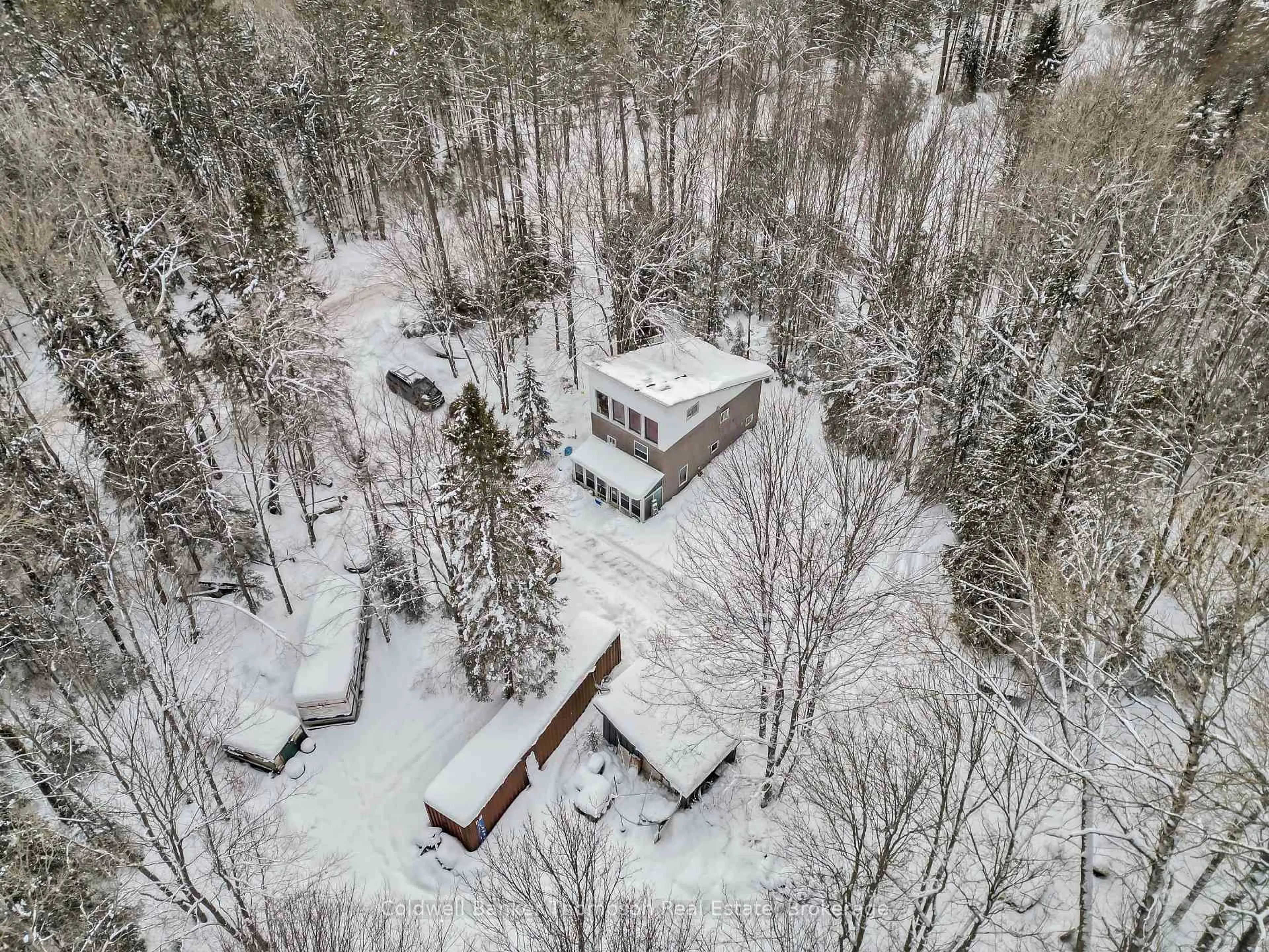 A pic from outside/outdoor area/front of a property/back of a property/a pic from drone, forest/trees view for 258 Star Lake Rd, Perry Ontario P0A 1J0