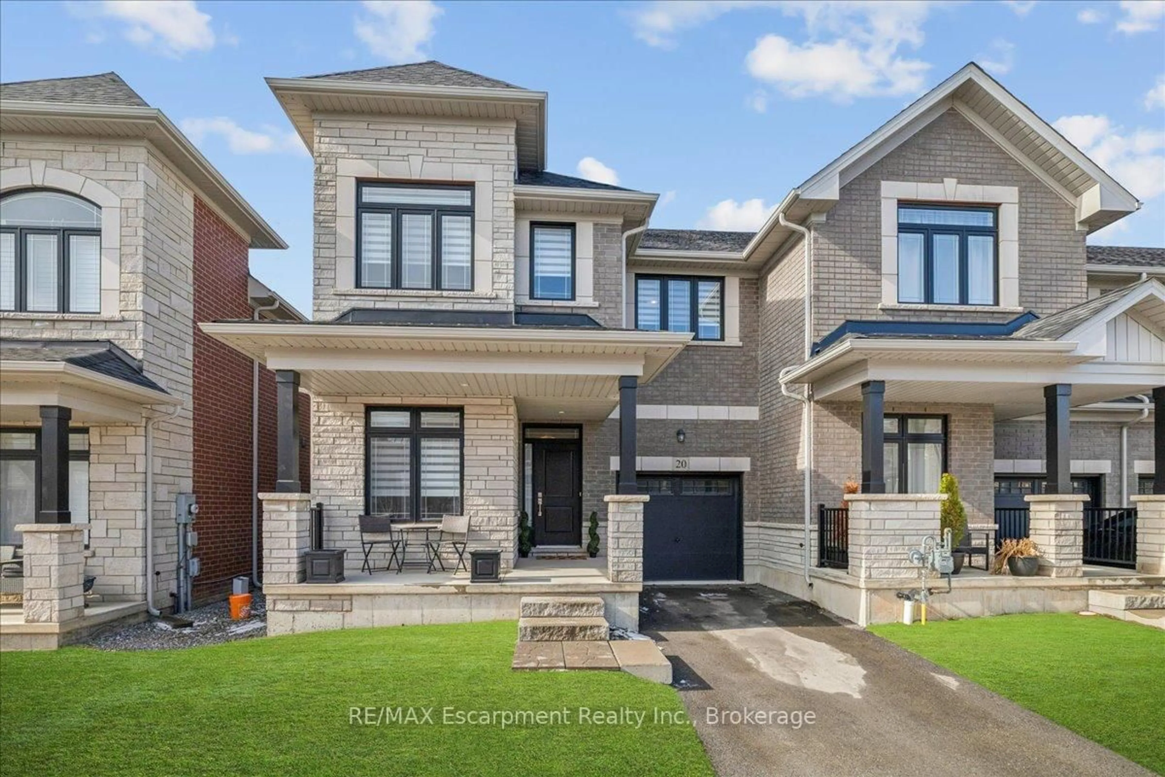 Home with brick exterior material, street for 20 Granite Ridge Tr, Hamilton Ontario L8B 1Y4