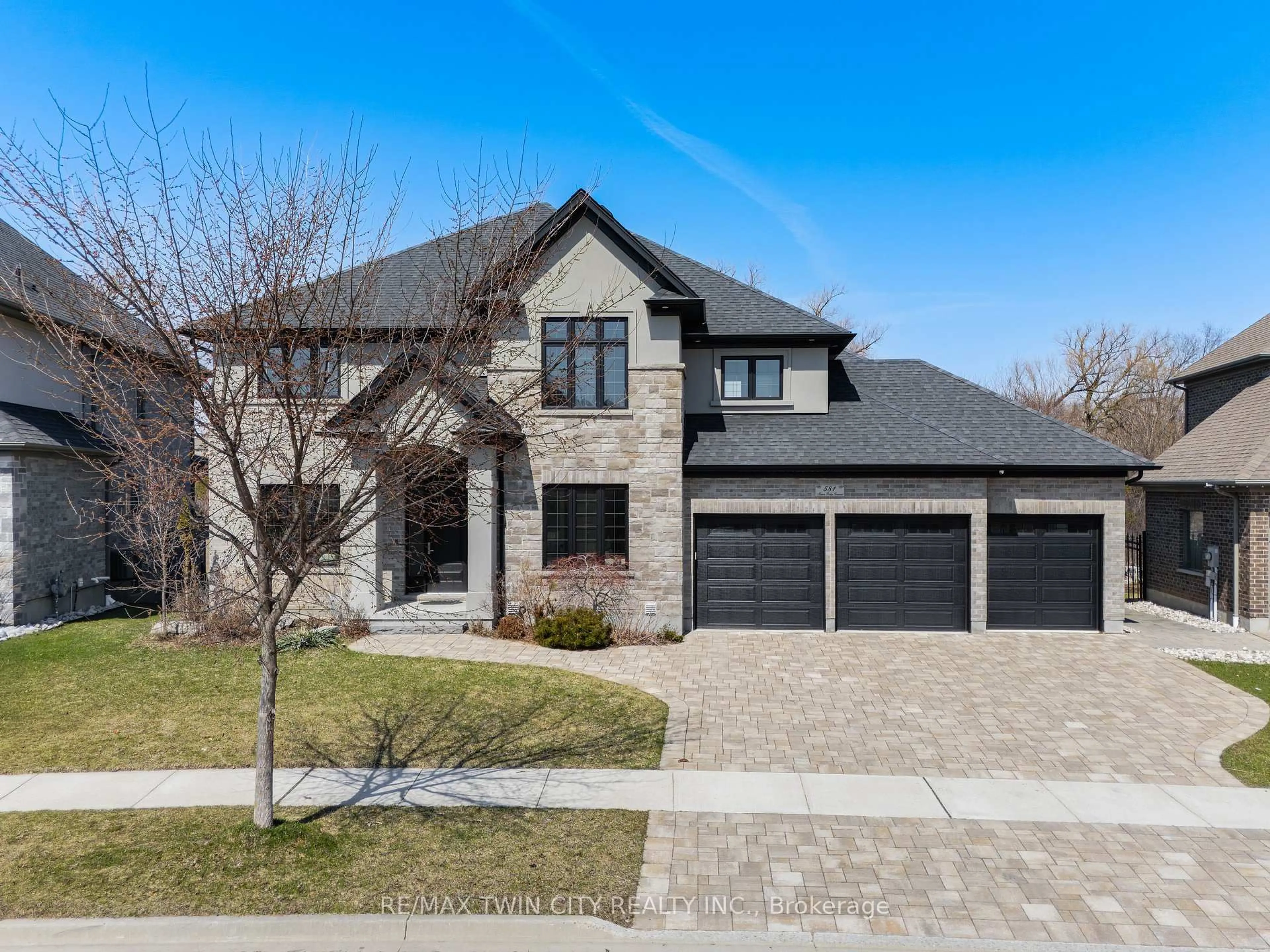 Home with brick exterior material, street for 581 Manor Ridge Cres, Waterloo Ontario N2K 0B4