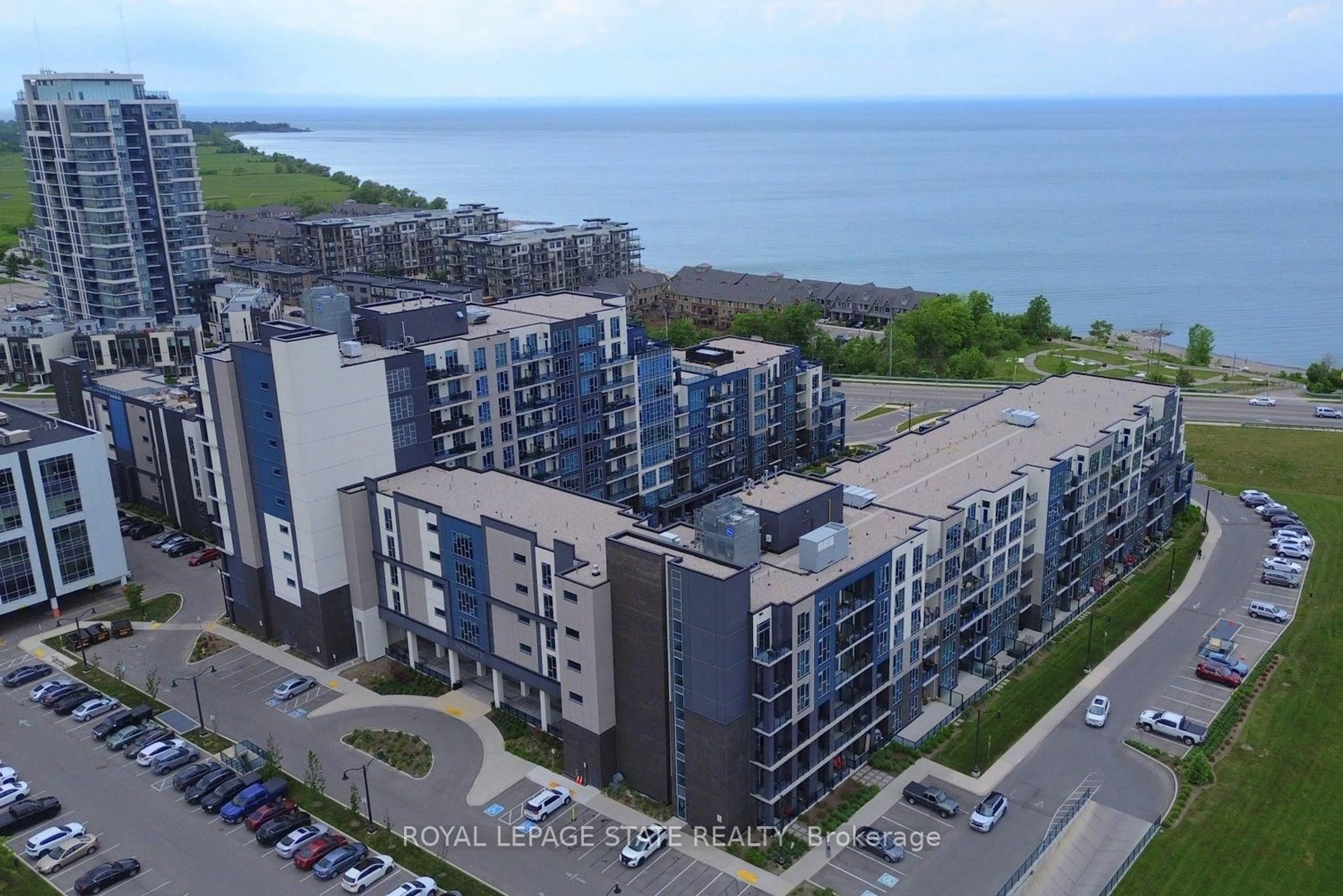 A pic from outside/outdoor area/front of a property/back of a property/a pic from drone, water/lake/river/ocean view for 16 Concord Pl #145, Grimsby Ontario L3M 0J1