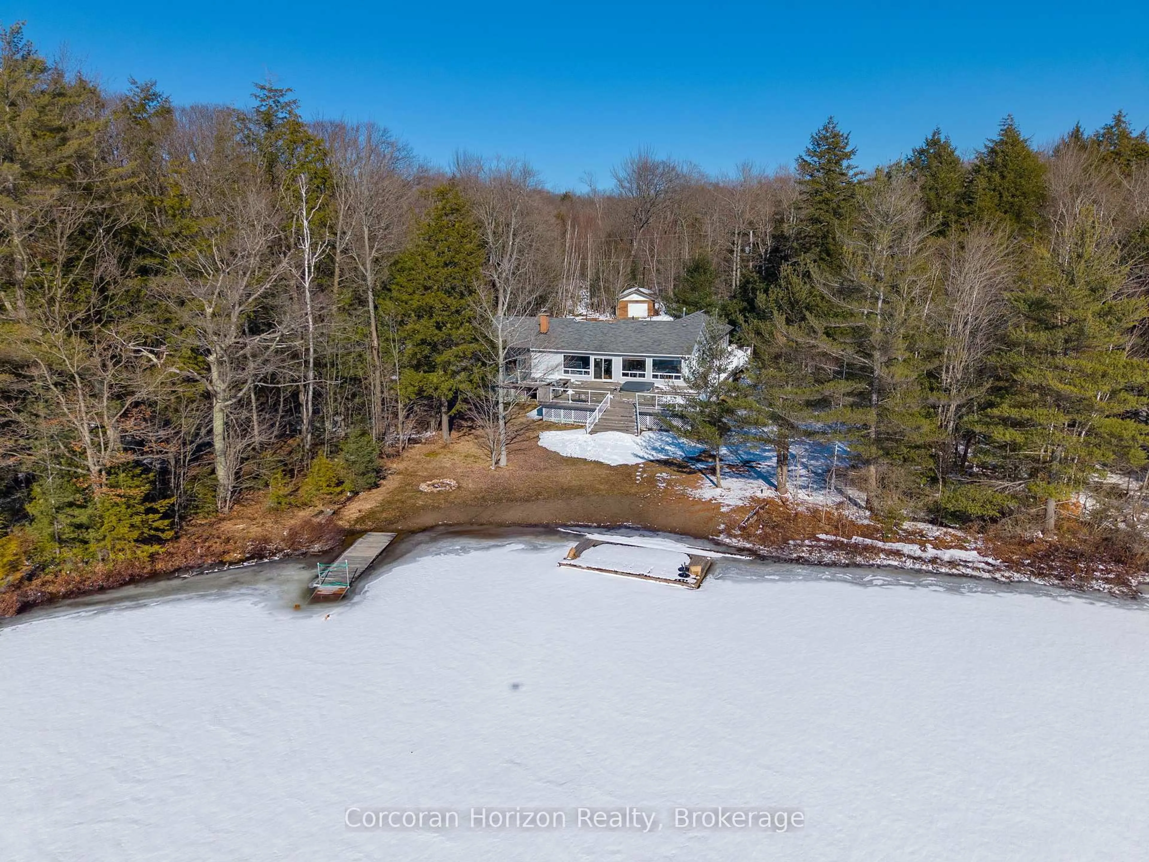 A pic from outside/outdoor area/front of a property/back of a property/a pic from drone, water/lake/river/ocean view for 1021 Hesners Lake Rd #10, Muskoka Lakes Ontario P0C 1A0