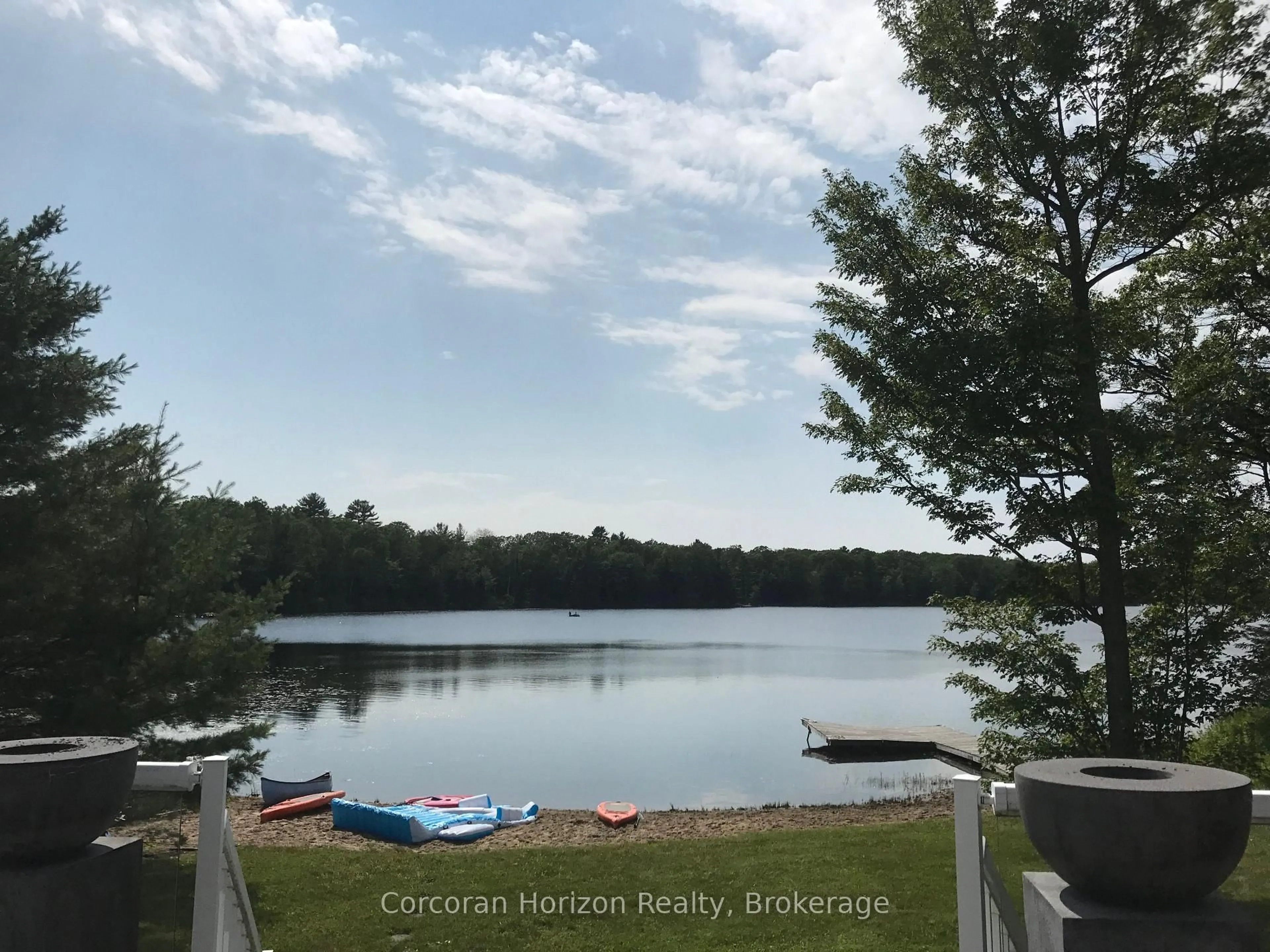 A pic from outside/outdoor area/front of a property/back of a property/a pic from drone, water/lake/river/ocean view for 1021 Hesners Lake Rd #10, Muskoka Lakes Ontario P0C 1A0