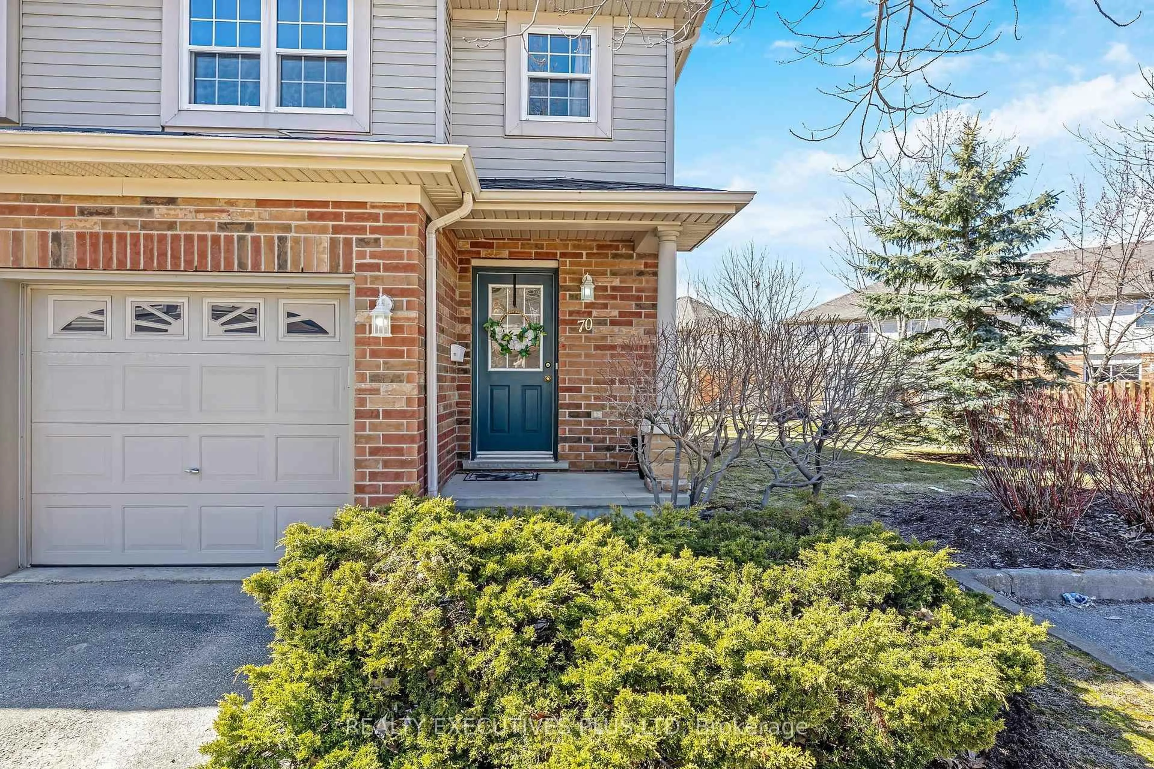 Home with brick exterior material, street for 30 Imperial Rd #70, Guelph Ontario N1K 1Y2