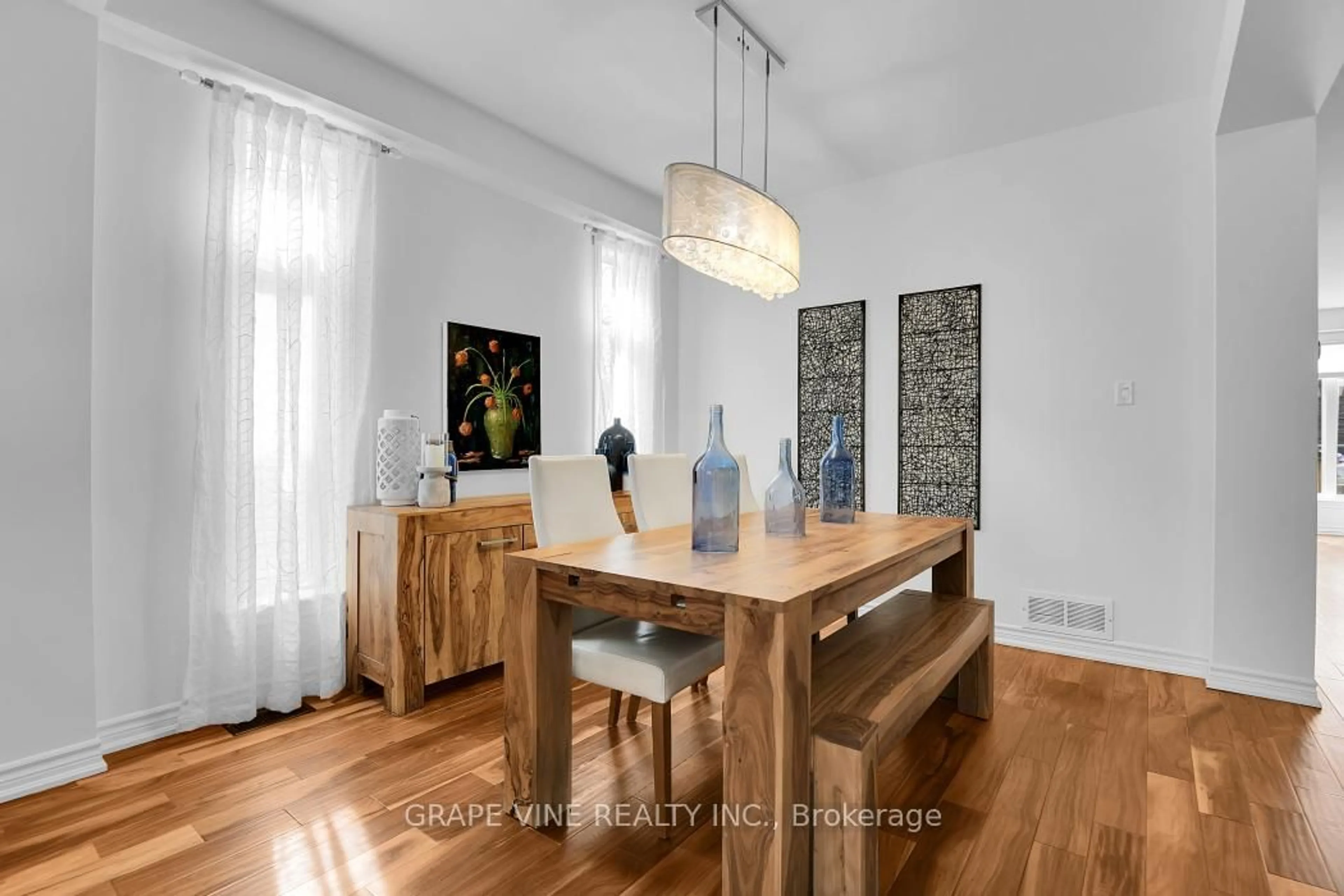 Dining room, wood/laminate floor for 517 Overland Dr, Ottawa Ontario K2S 0C2