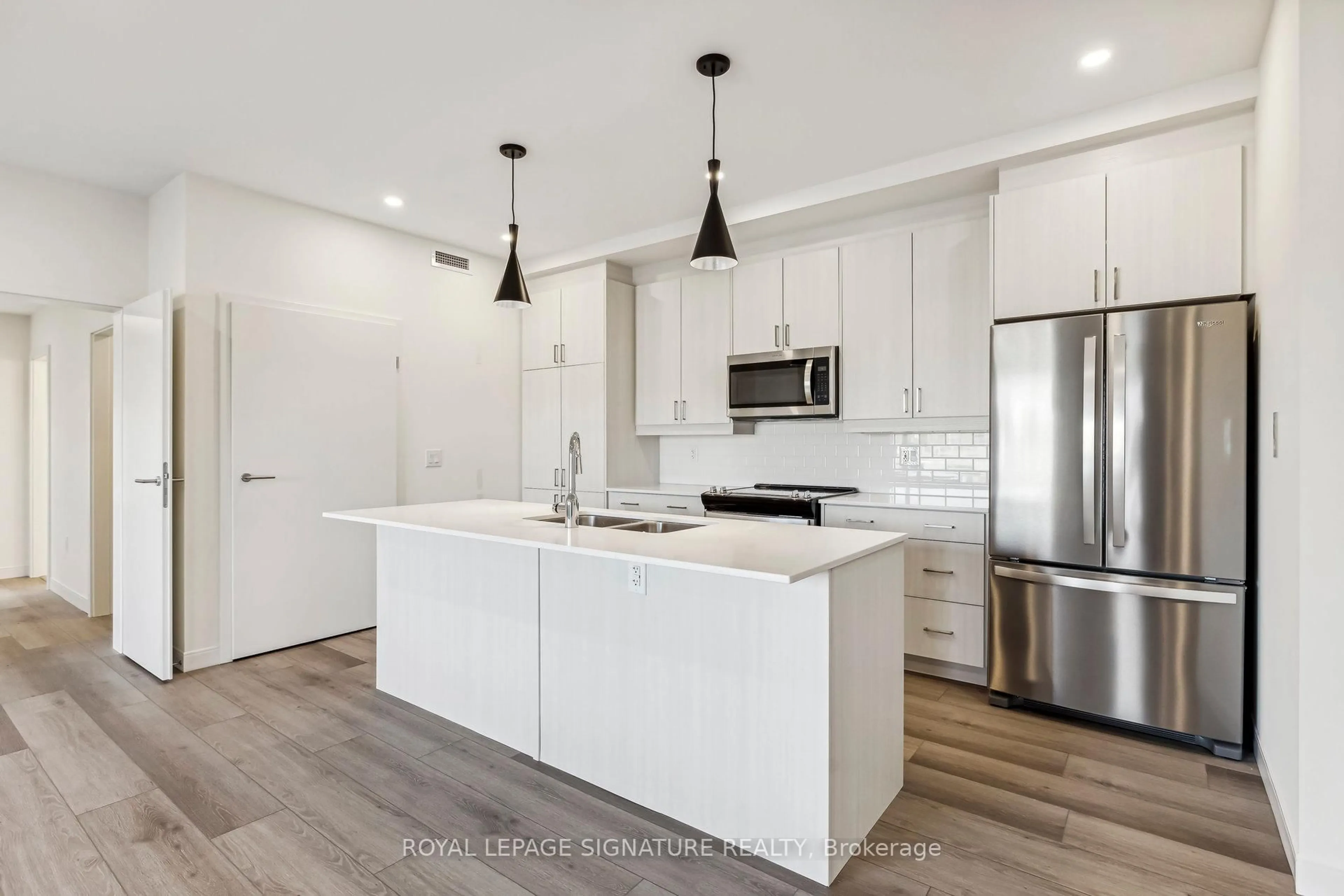 Open concept kitchen, unknown for 123 Lincoln St #106, Welland Ontario L3C 5J7