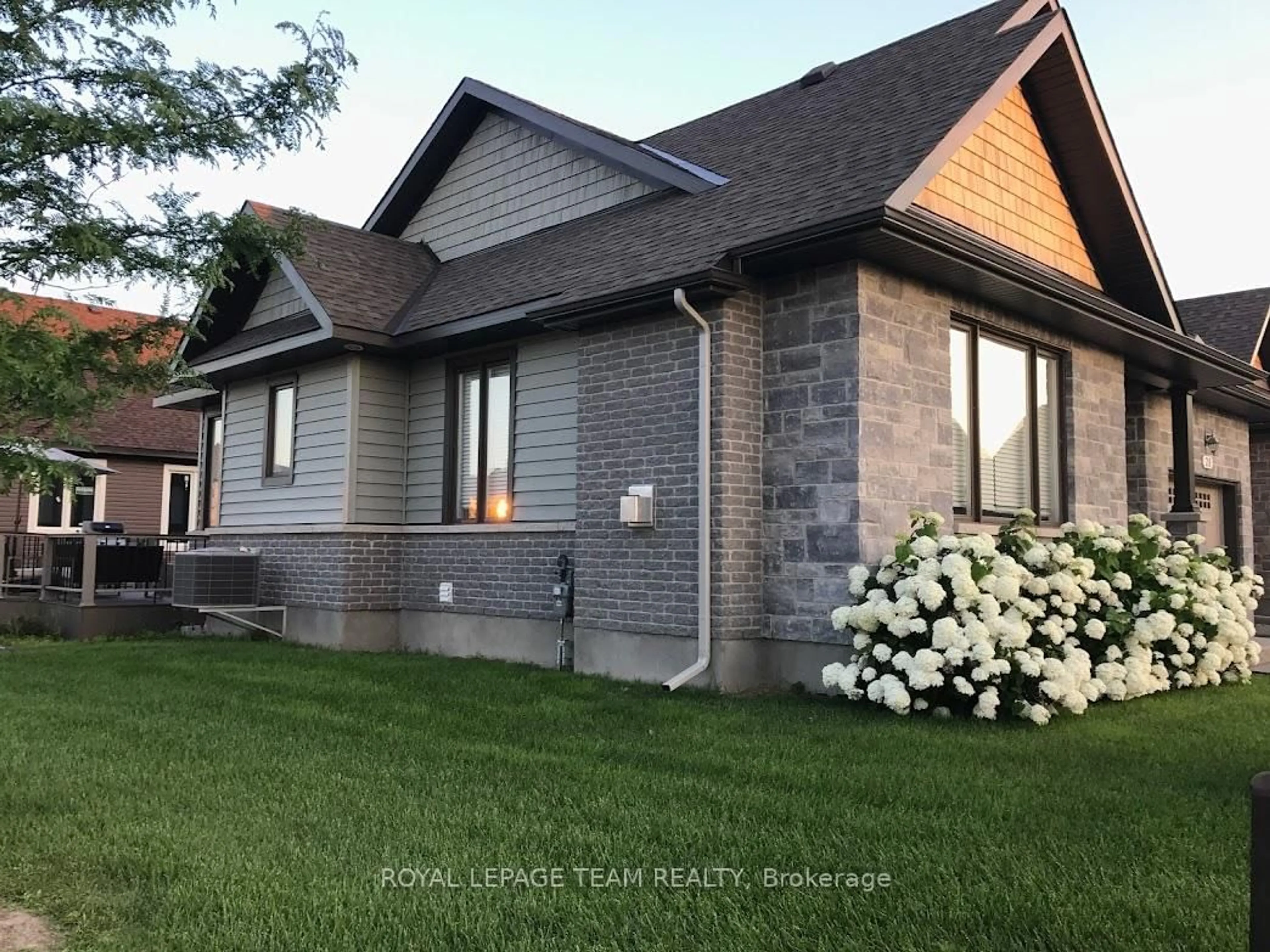 Home with brick exterior material, street for 28 Magnolia Way, North Grenville Ontario K0G 1J0