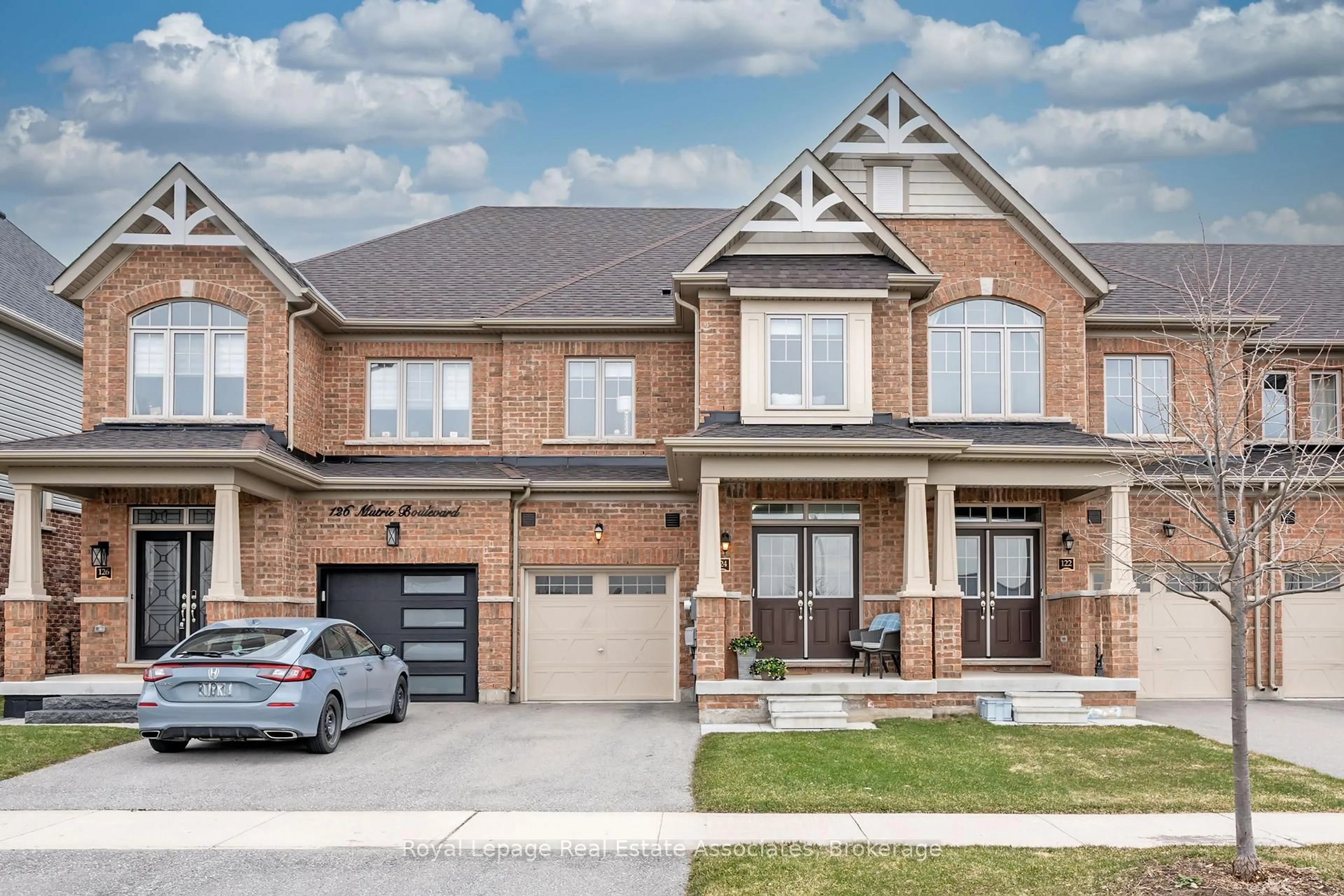 Home with brick exterior material, street for 124 Mutrie Blvd, Guelph/Eramosa Ontario N0B 2K0