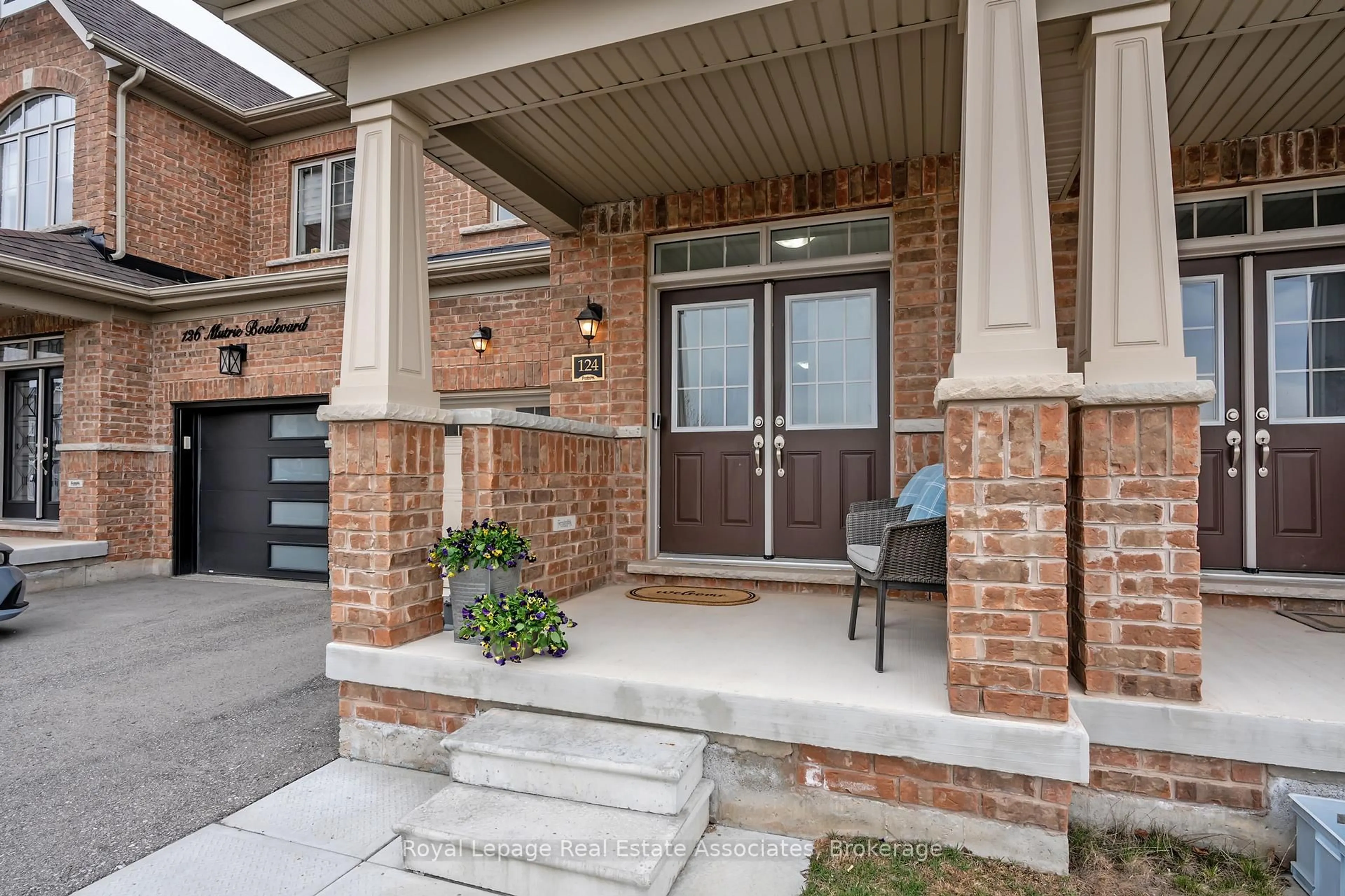 Home with brick exterior material, street for 124 Mutrie Blvd, Guelph/Eramosa Ontario N0B 2K0