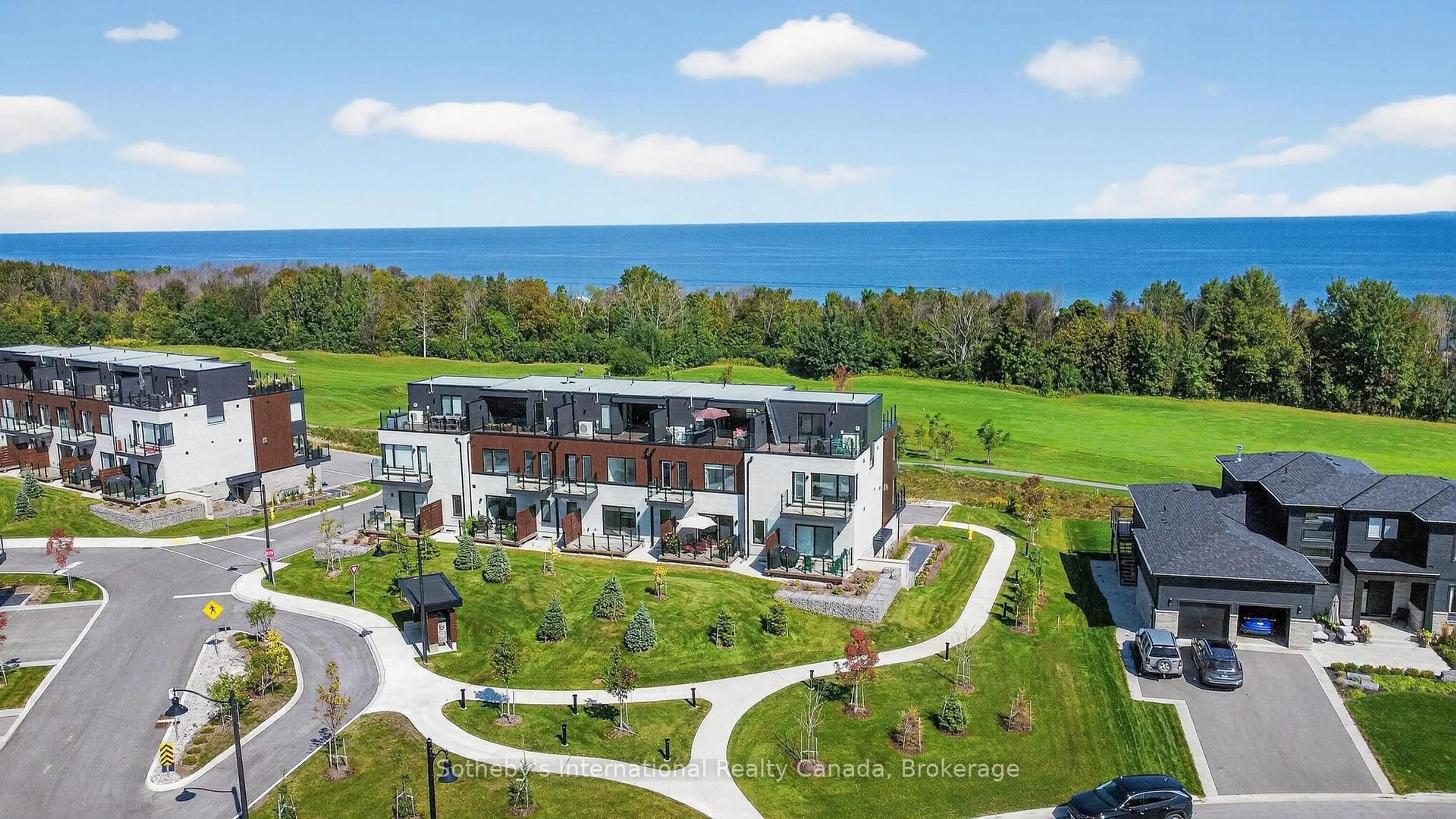 A pic from outside/outdoor area/front of a property/back of a property/a pic from drone, water/lake/river/ocean view for 117 Sladden Crt #32, Blue Mountains Ontario N0H 2P0