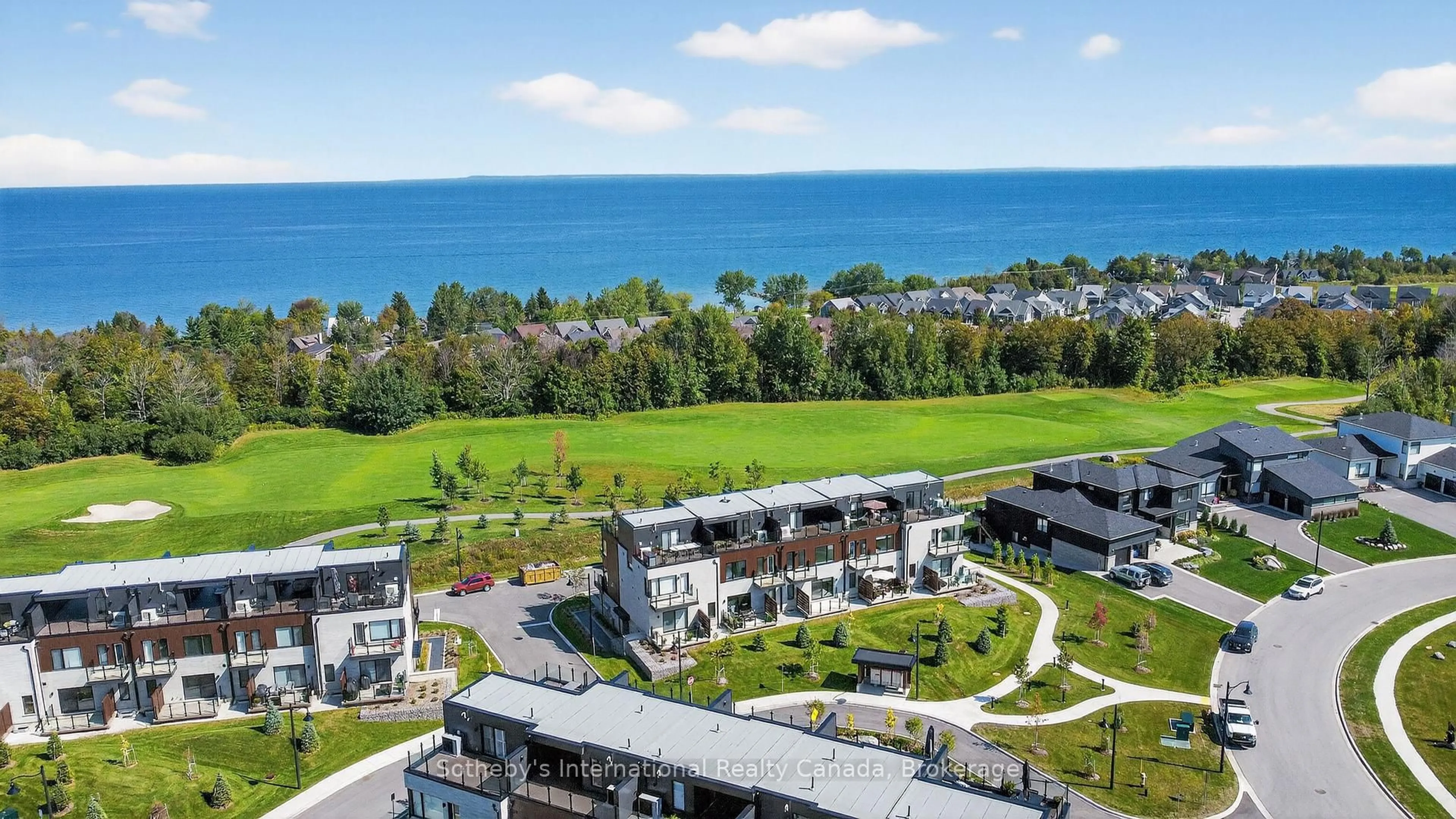 A pic from outside/outdoor area/front of a property/back of a property/a pic from drone, water/lake/river/ocean view for 117 Sladden Crt #32, Blue Mountains Ontario N0H 2P0