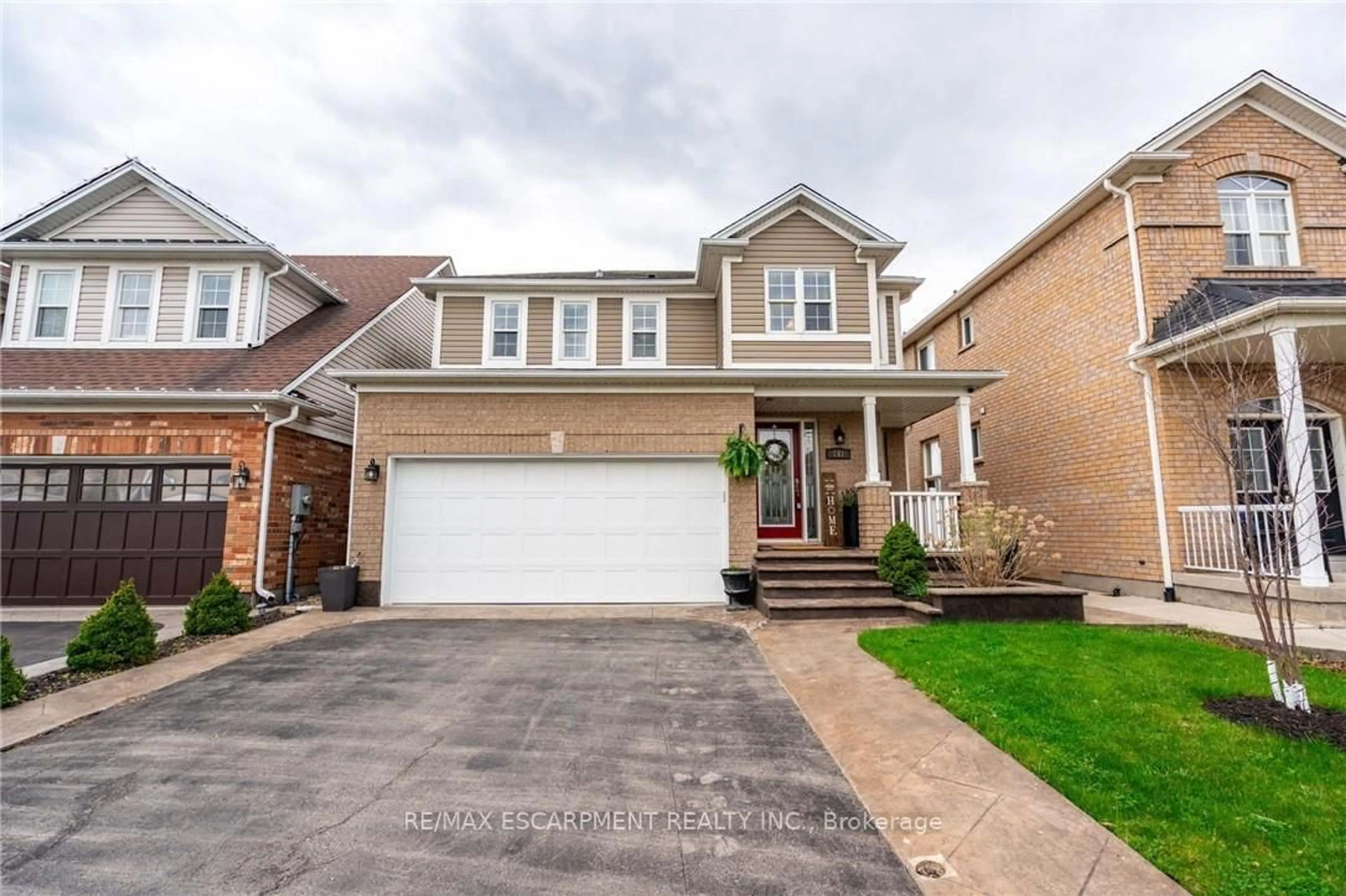 Home with brick exterior material, street for 141 Voyager Pass, Hamilton Ontario L0R 1C0