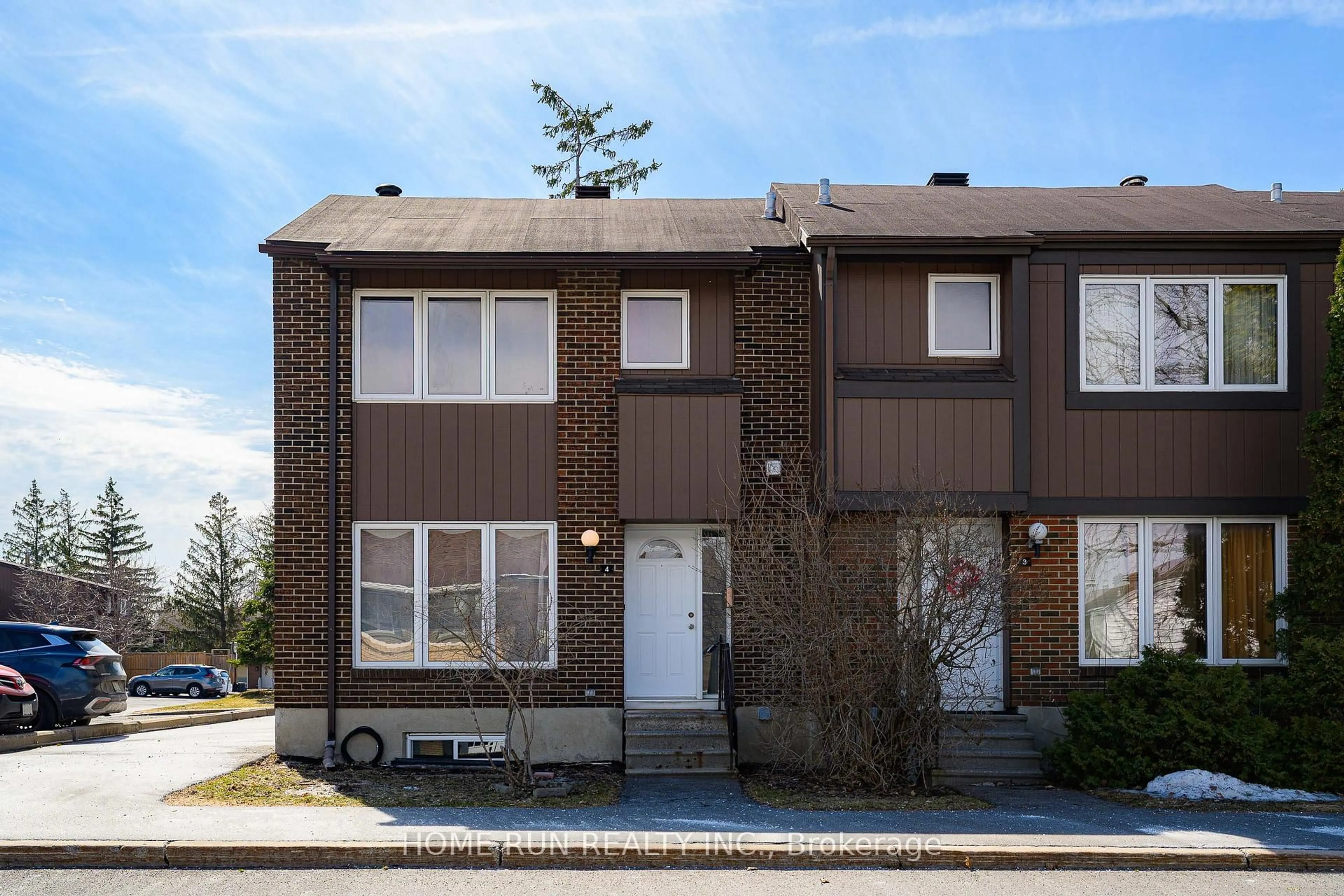 Home with brick exterior material, street for 2111 Montreal Rd #4, Ottawa Ontario K1J 8M8